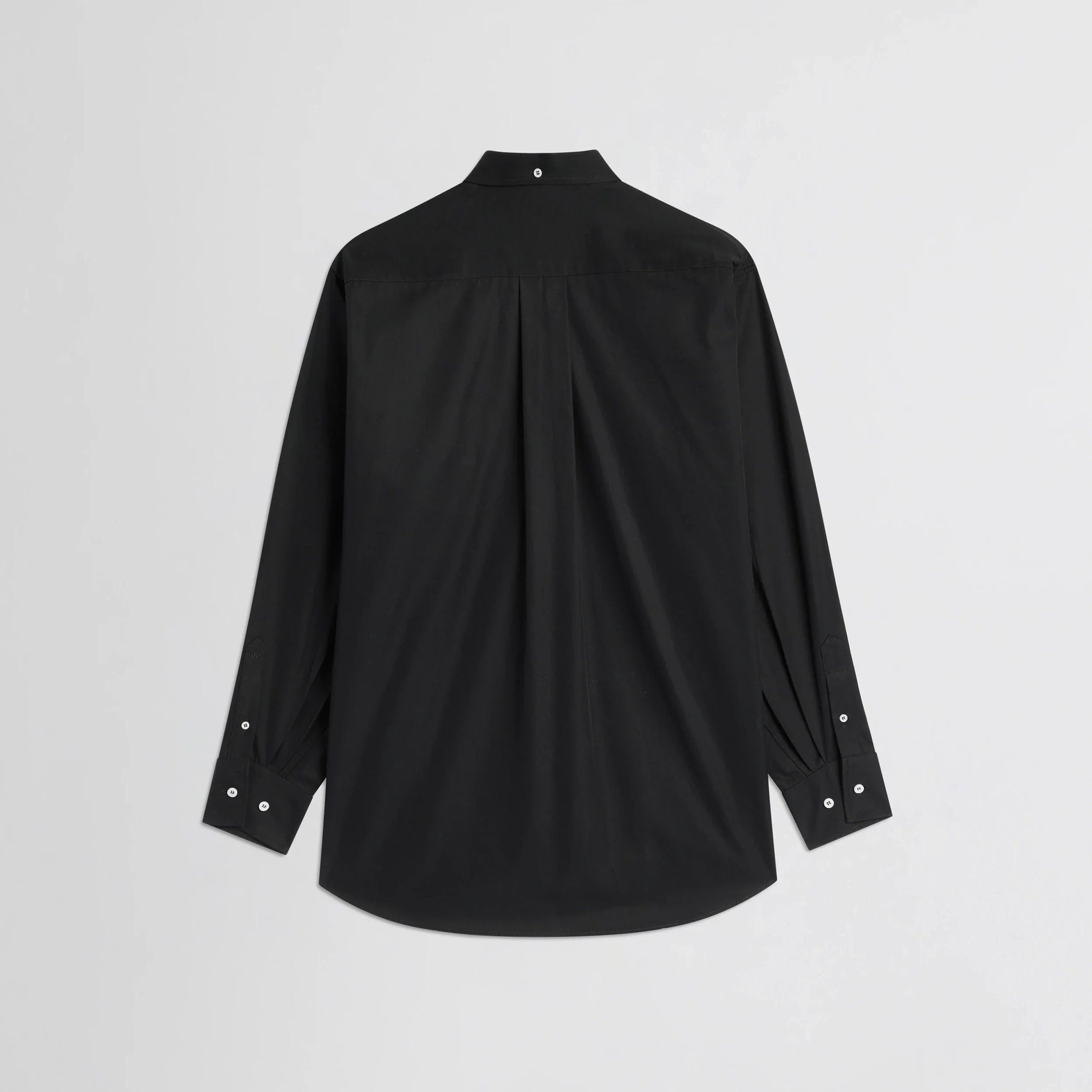 Flat back view of button collar shirt in black cotton.
