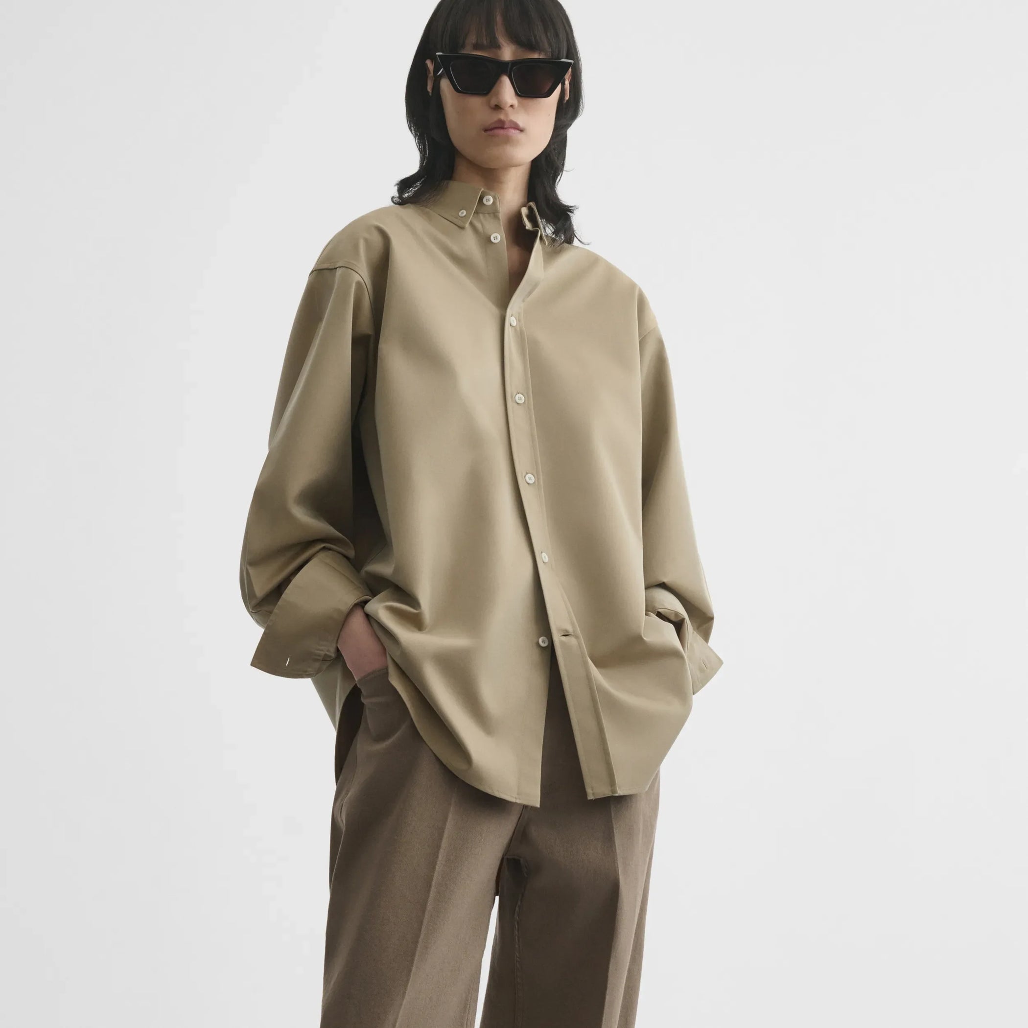 Front view of button collar shirt in trench cotton