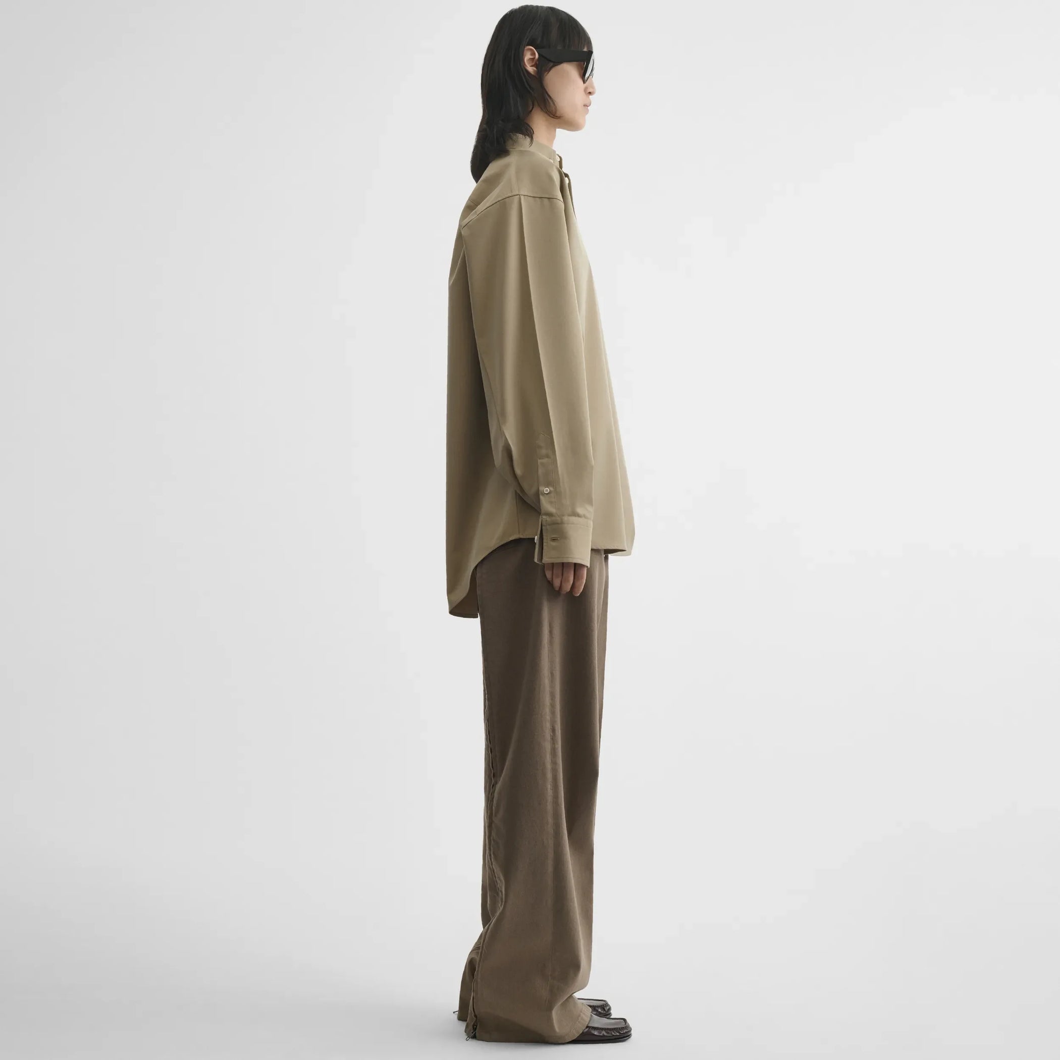 Side view of button collar shirt in trench cotton