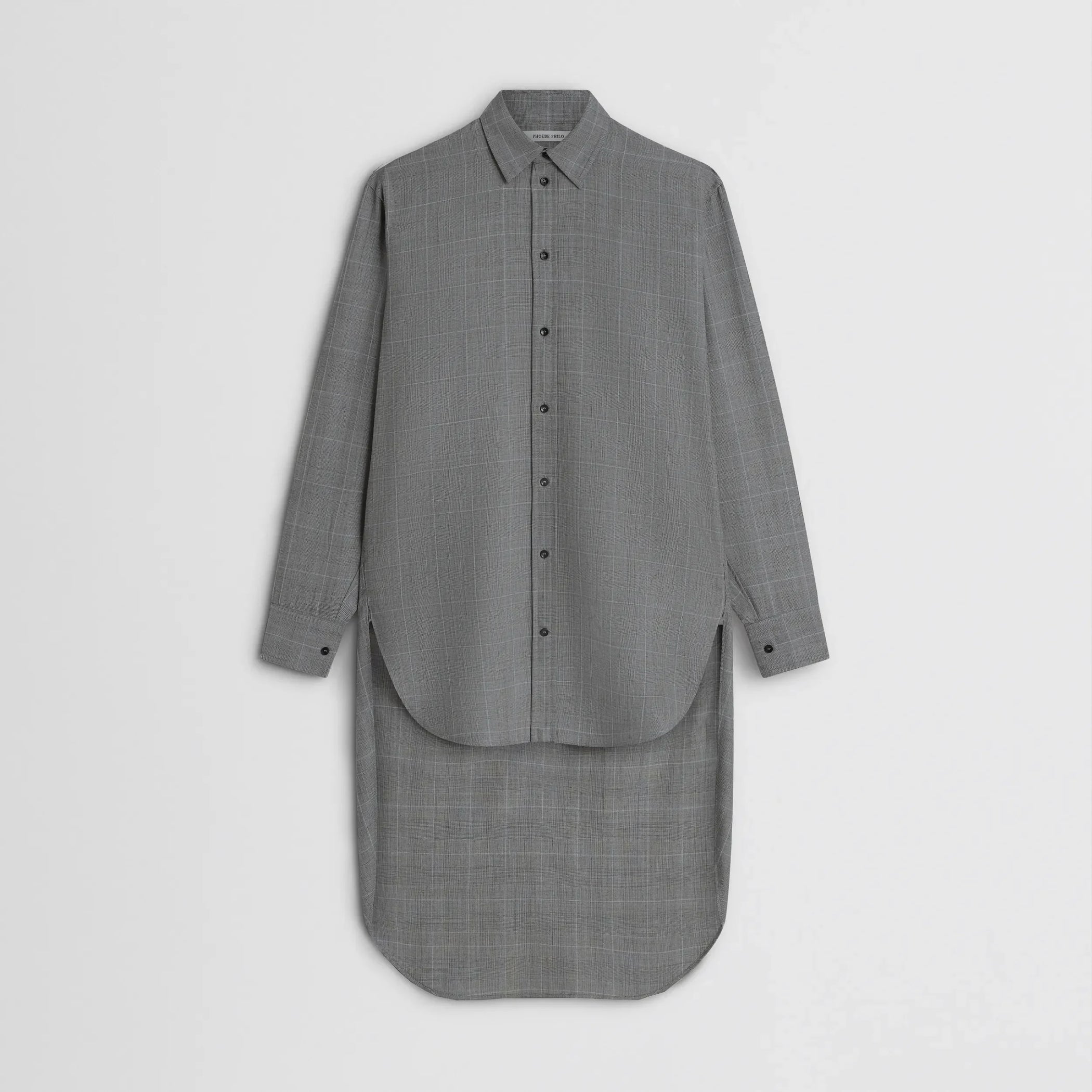Flat front view of elongated shirt in black-blue wool