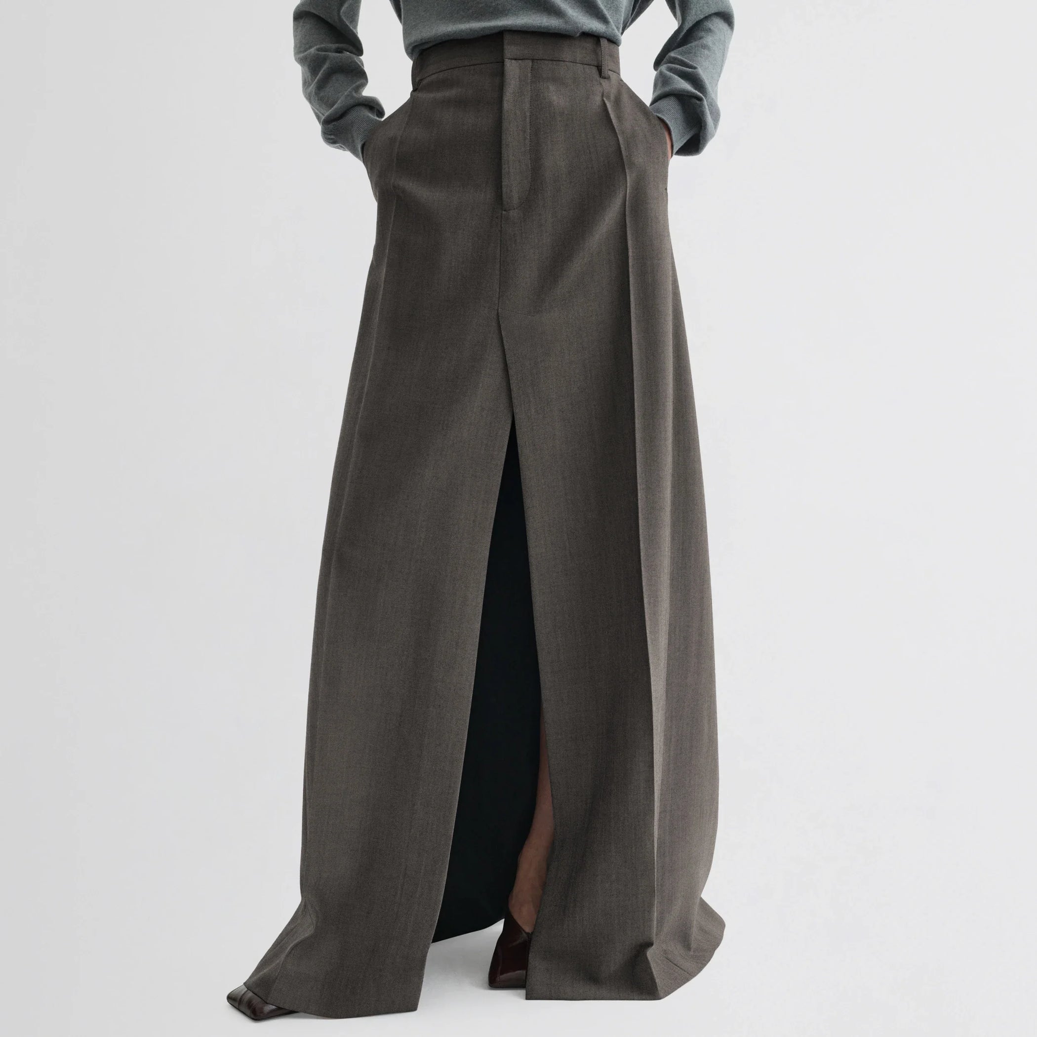 Front view of double slit tailored skirt in dark taupe wool.
