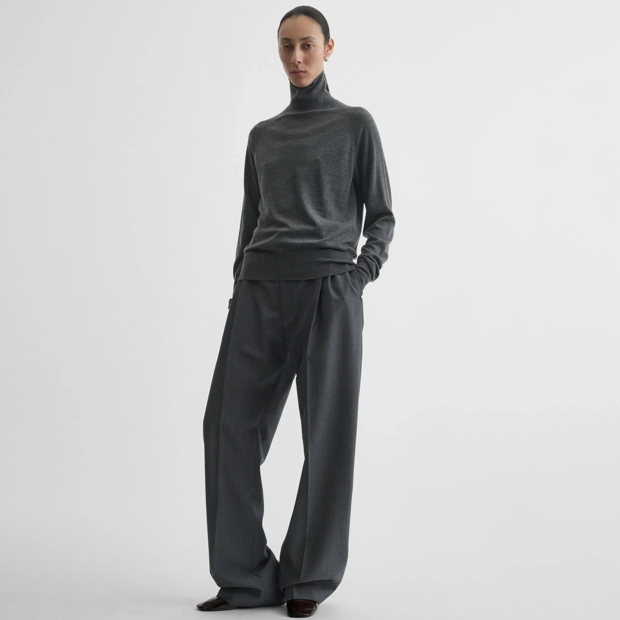 Front view of high neck jumper in anthracite-melange wool