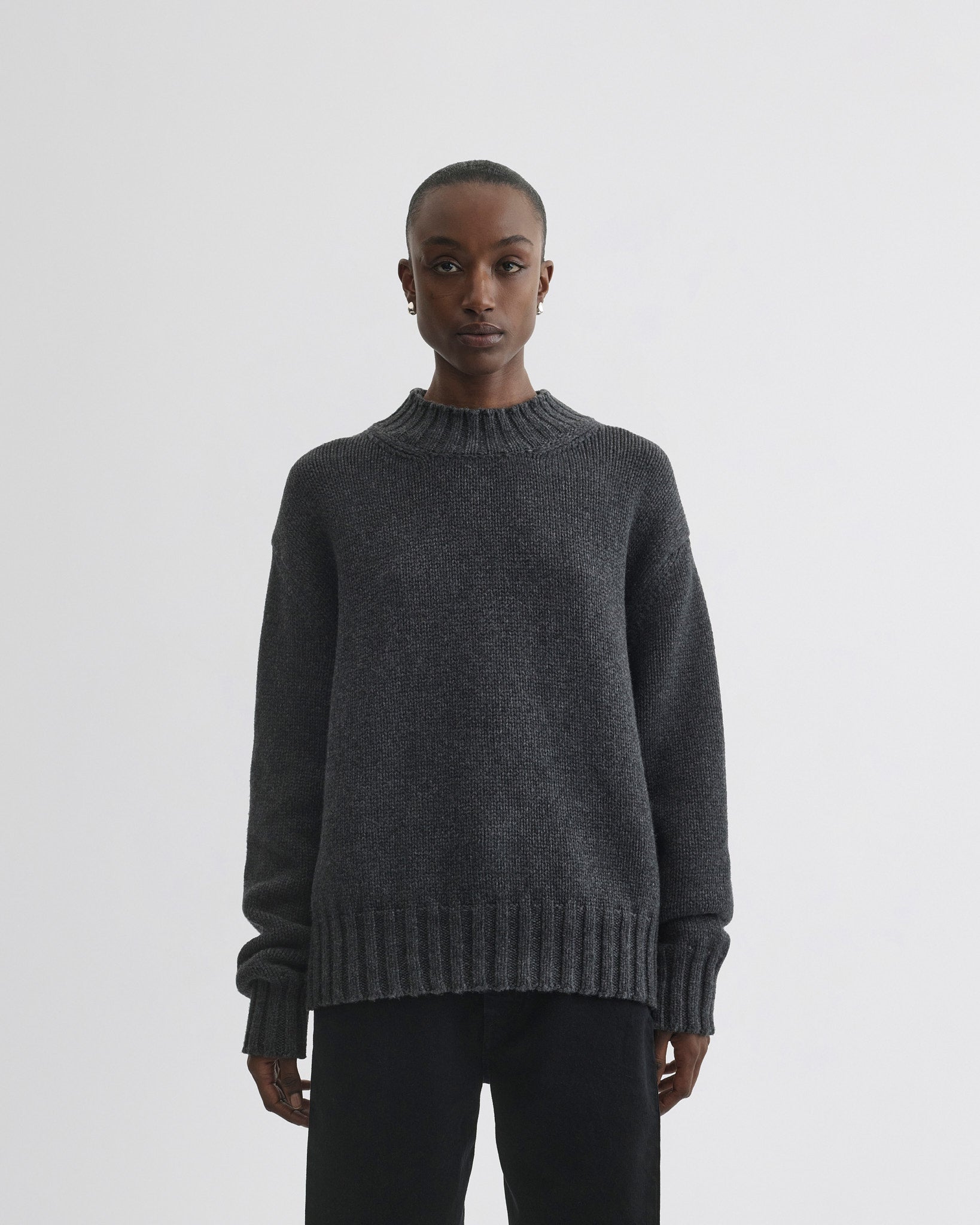 Front view of model wearing Crewneck Jumper in grey cashmere