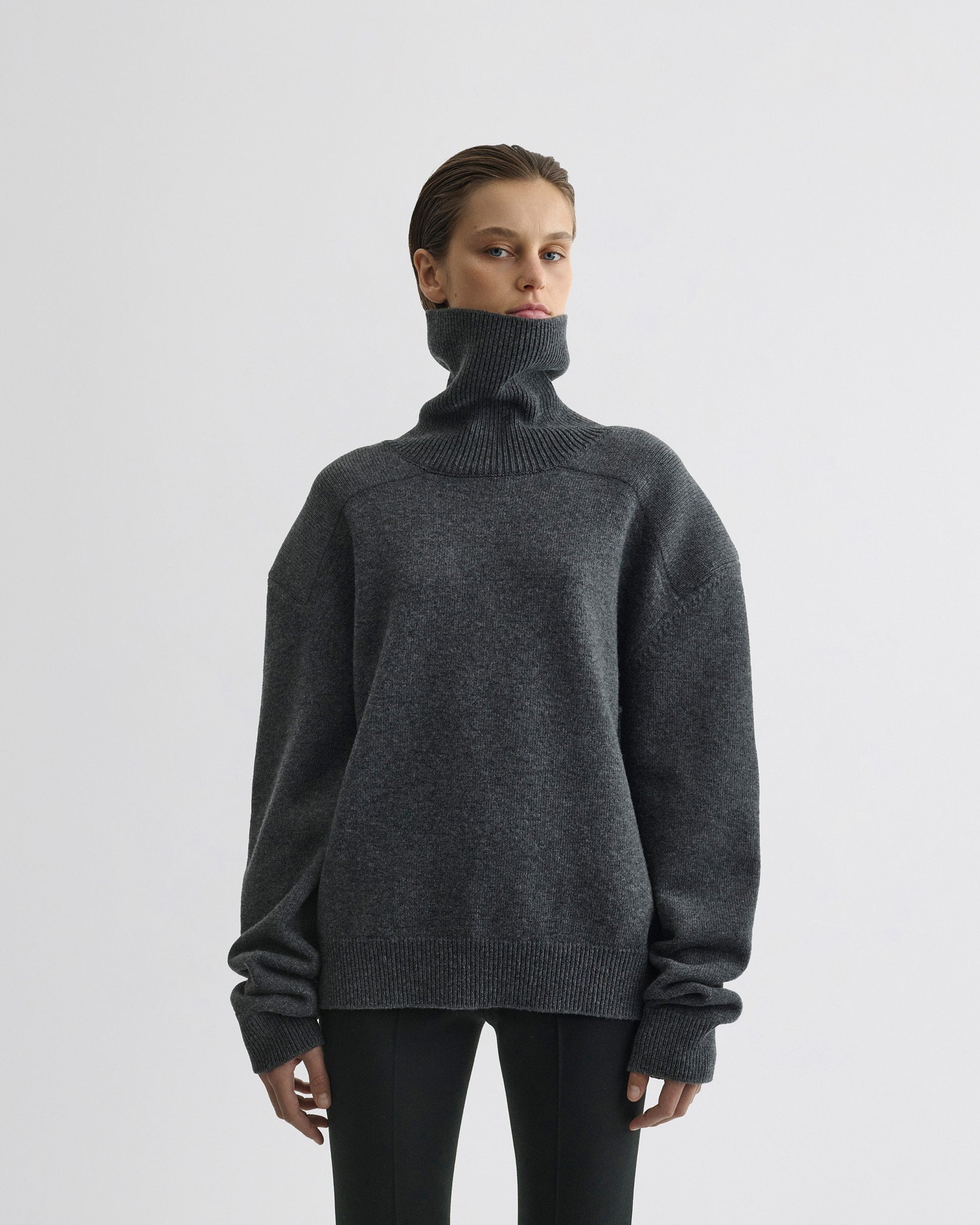 Front view of model wearing Patch Shoulder Jumper in grey melange wool cashmere