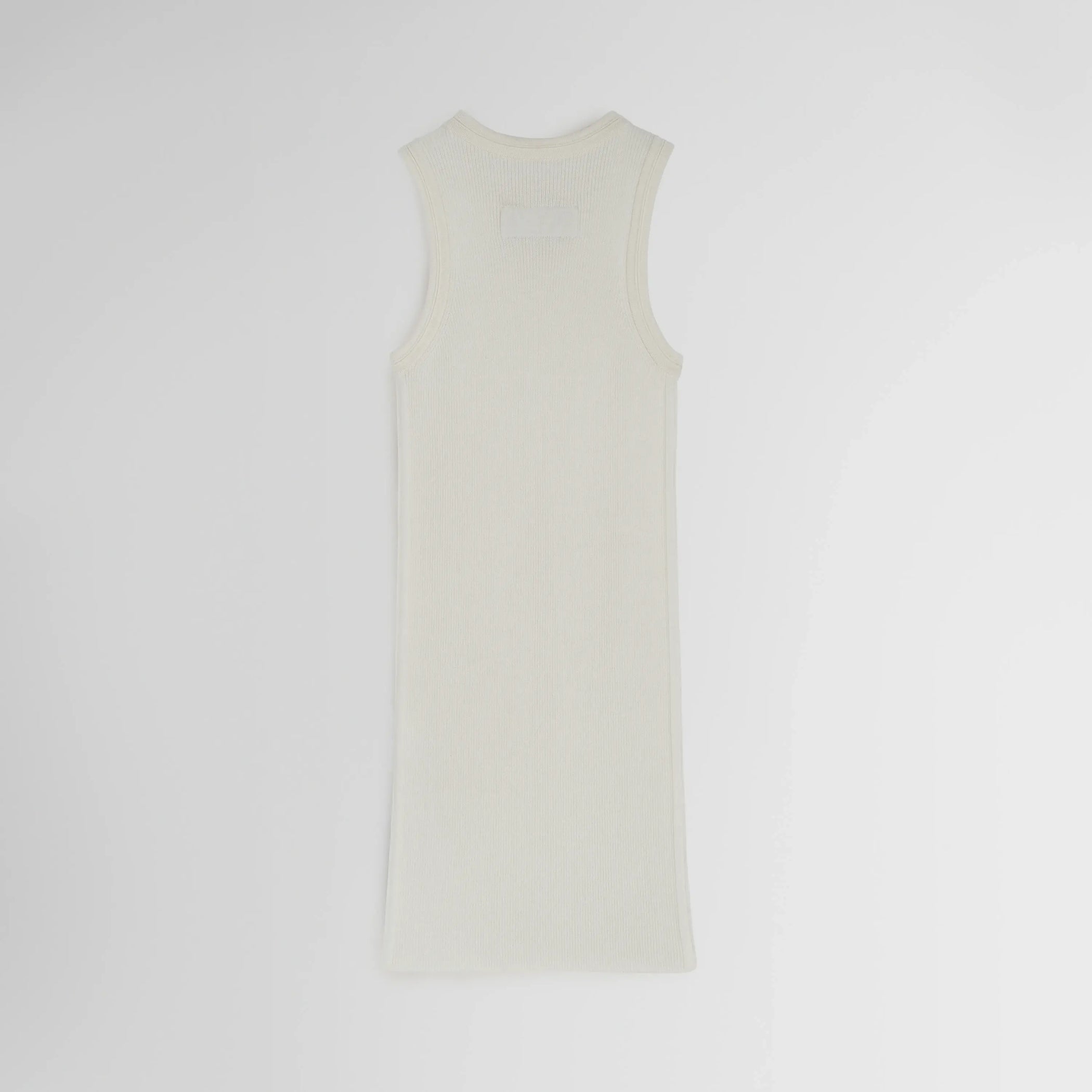 Back flat lay of light merino wool rib tank top in cream