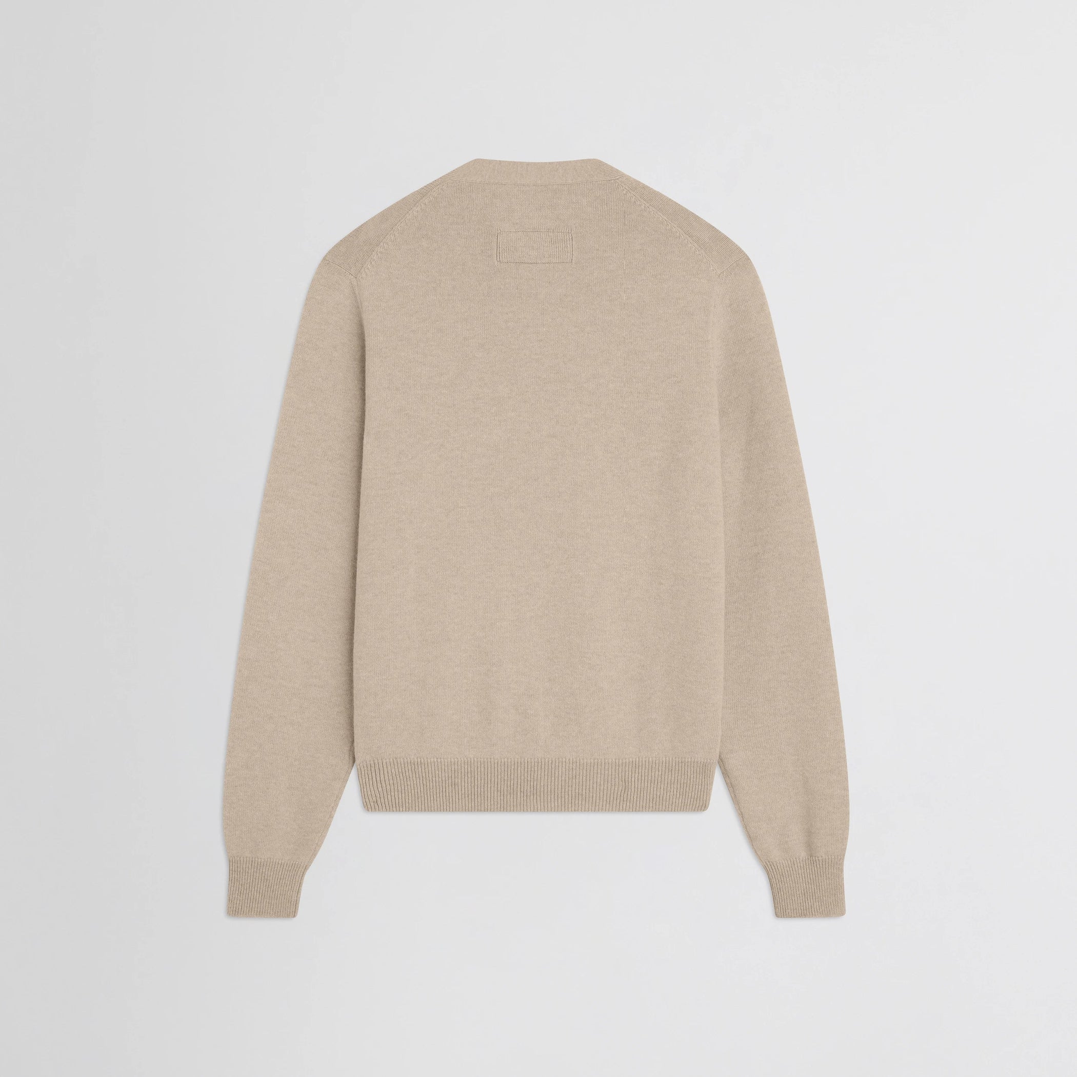 Flat back view of easy v-neck sweater in beige wool cashmere