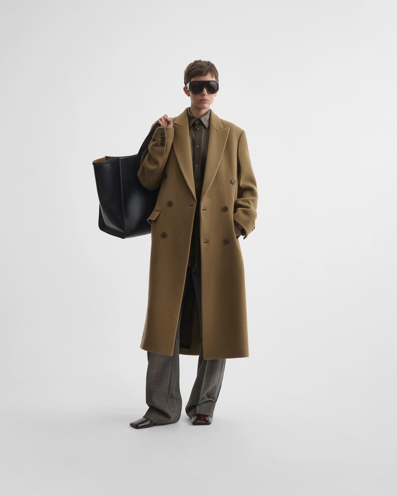 Front view of model wearing man's coat in tobacco cashmere