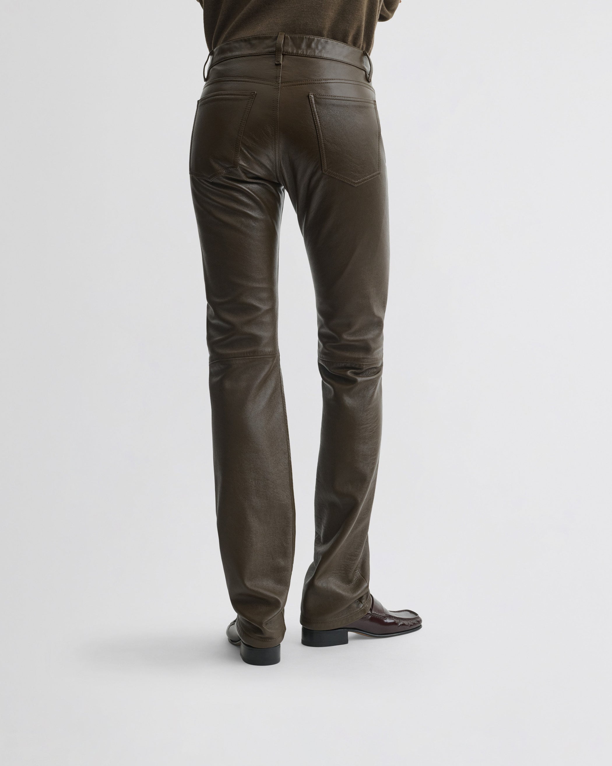 View of straight leg jeans in green bronze leather