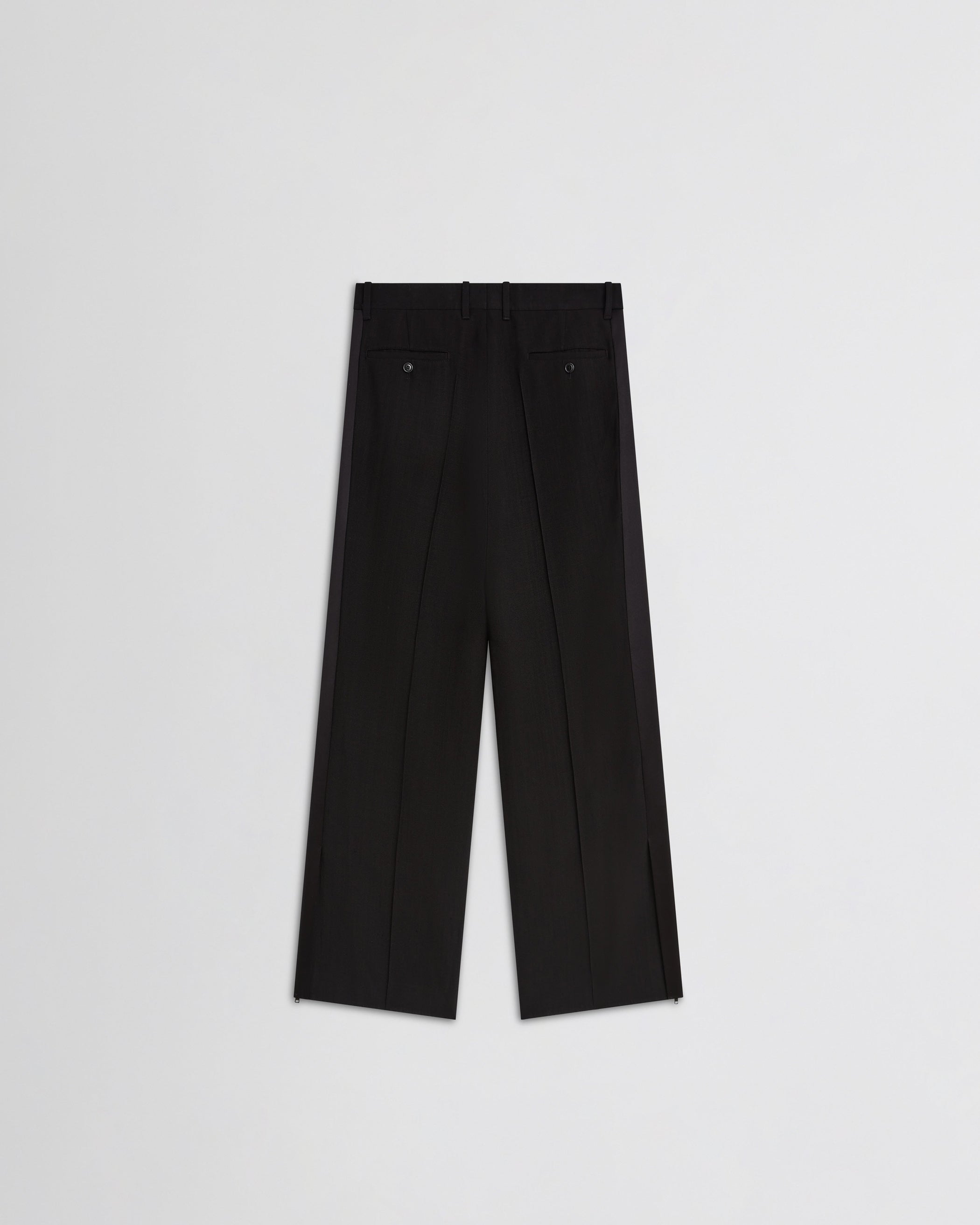 View of split tux trousers in black wool