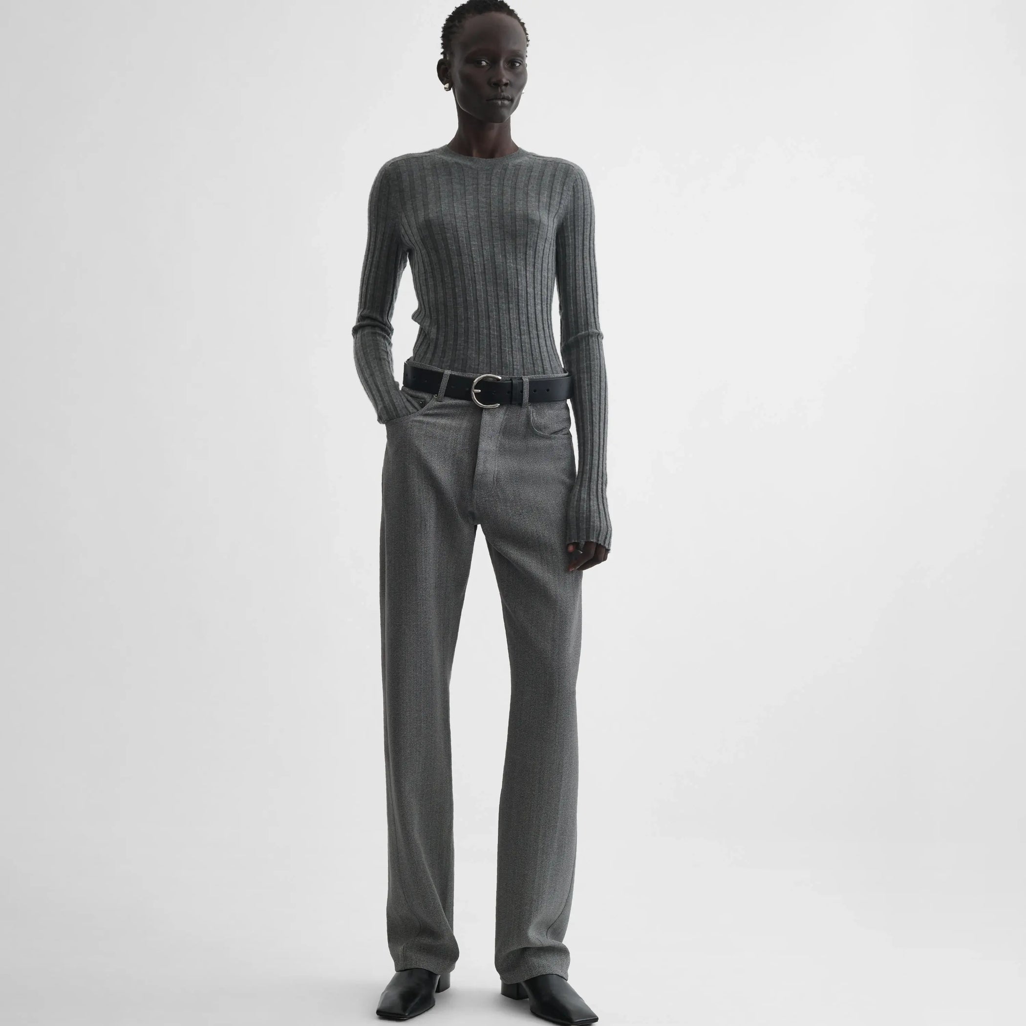 Full body front view of model wearing classic jeans in mist
