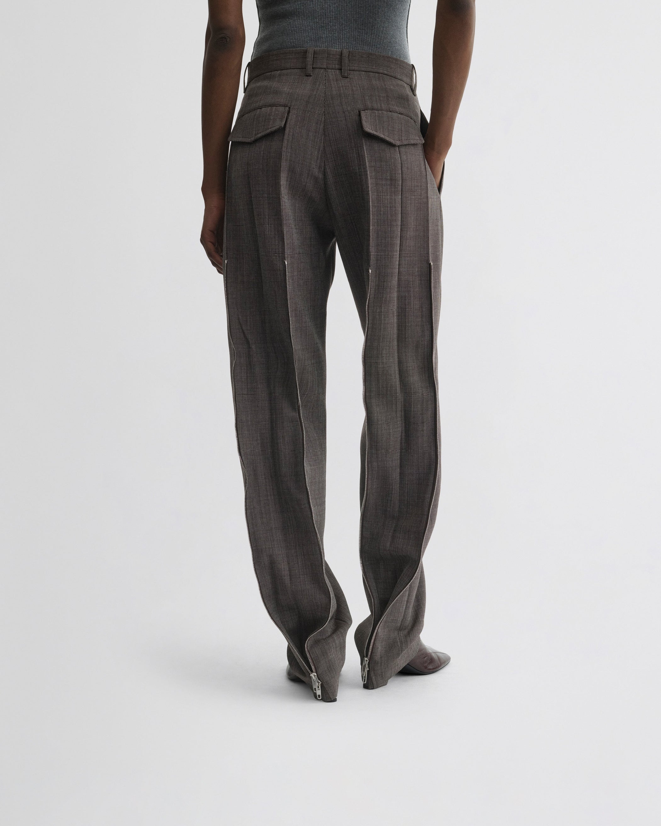 View of split zip trousers in dark brown mélange wool