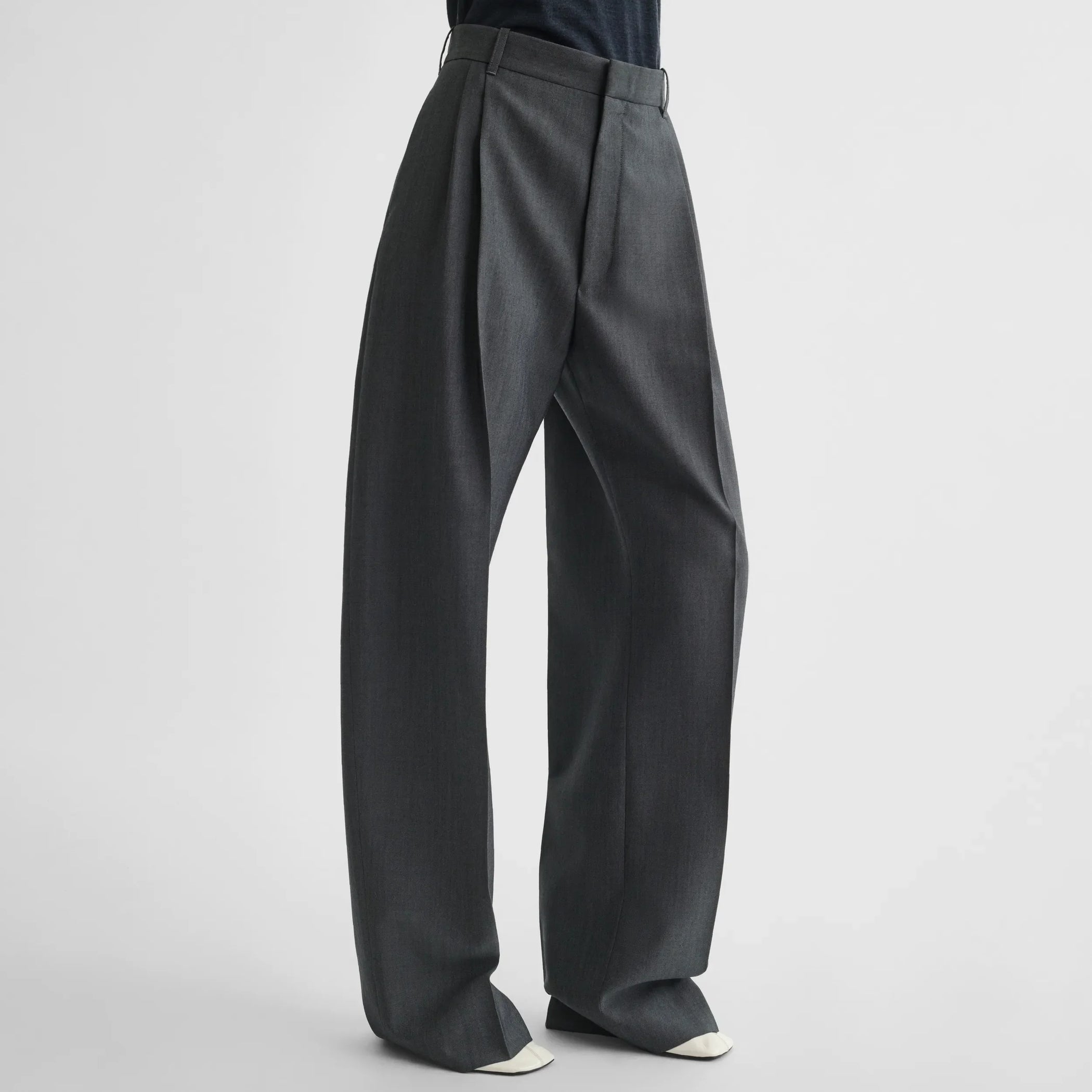 Side view of double pleat trousers in grey-melange wool