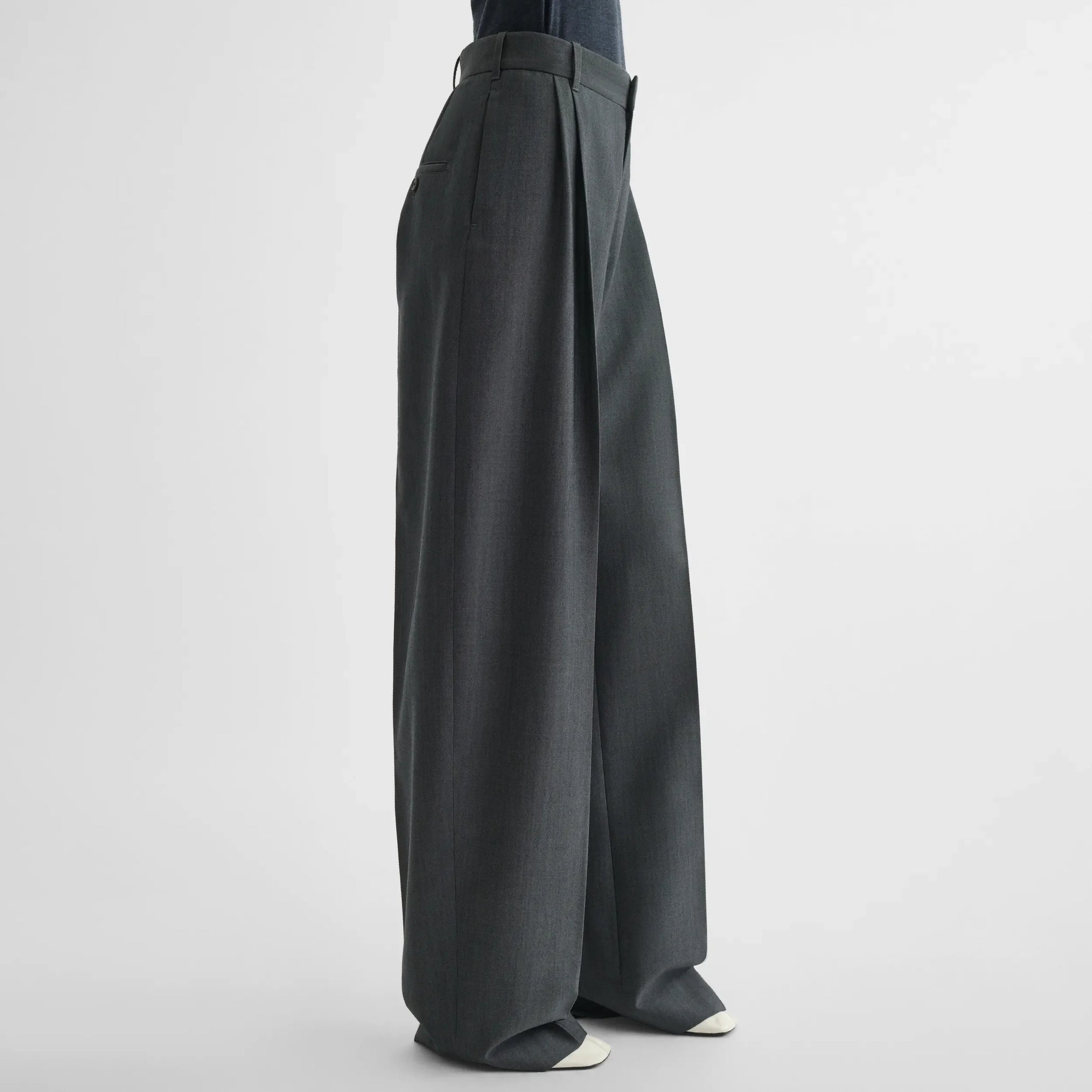 Side view of double pleat trousers in grey-melange wool