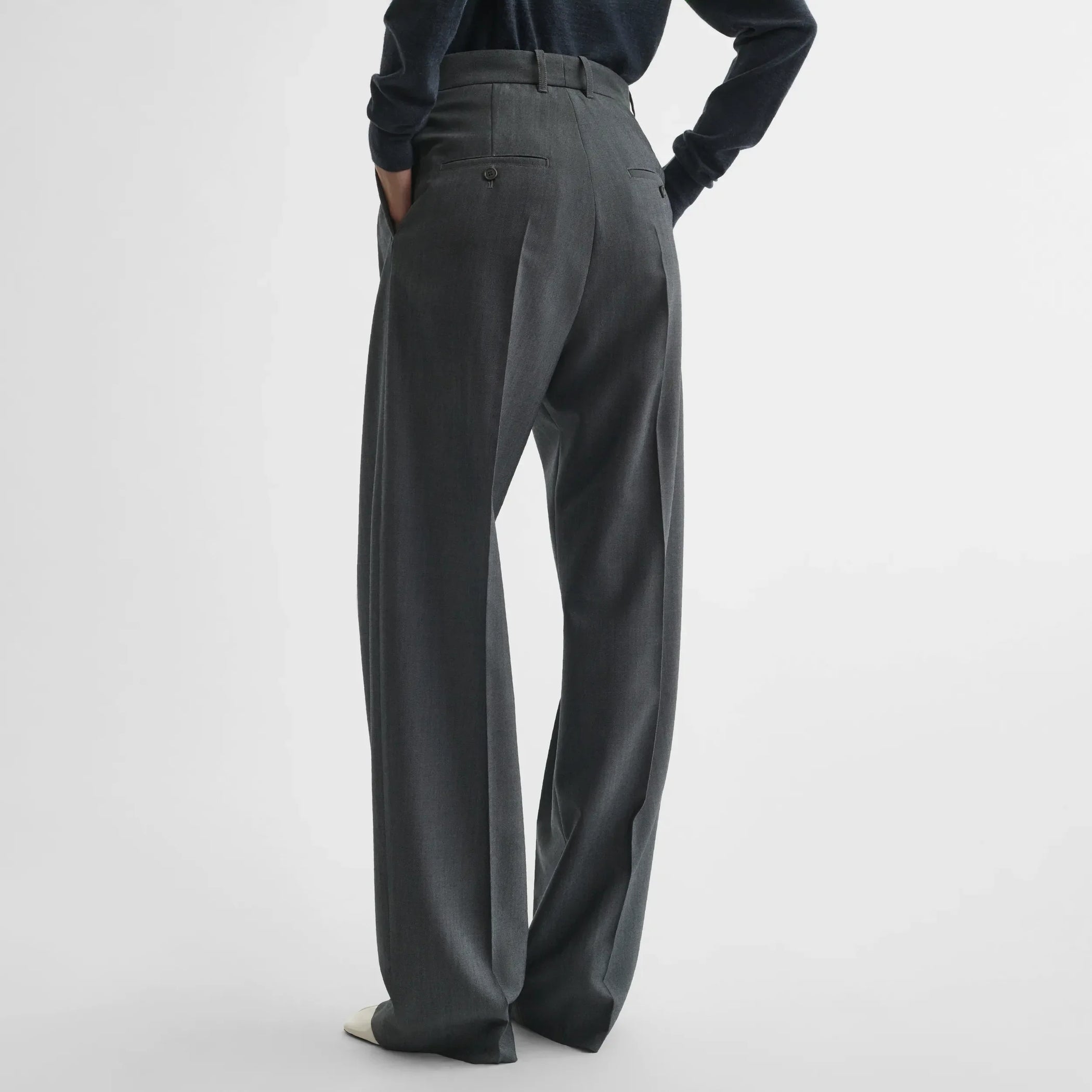 Back view of double pleat trousers in grey-melange wool
