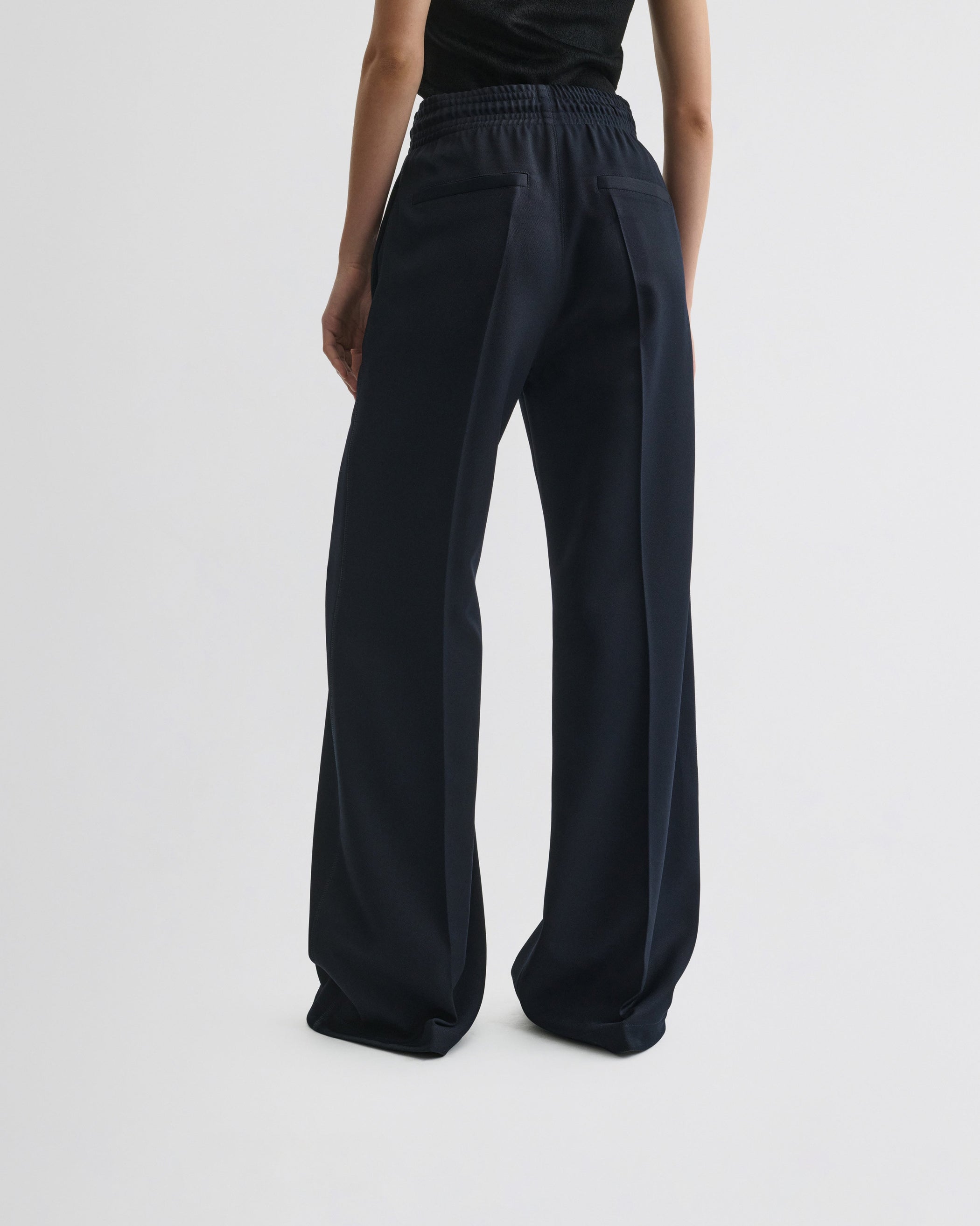 View of track trousers in navy polyester