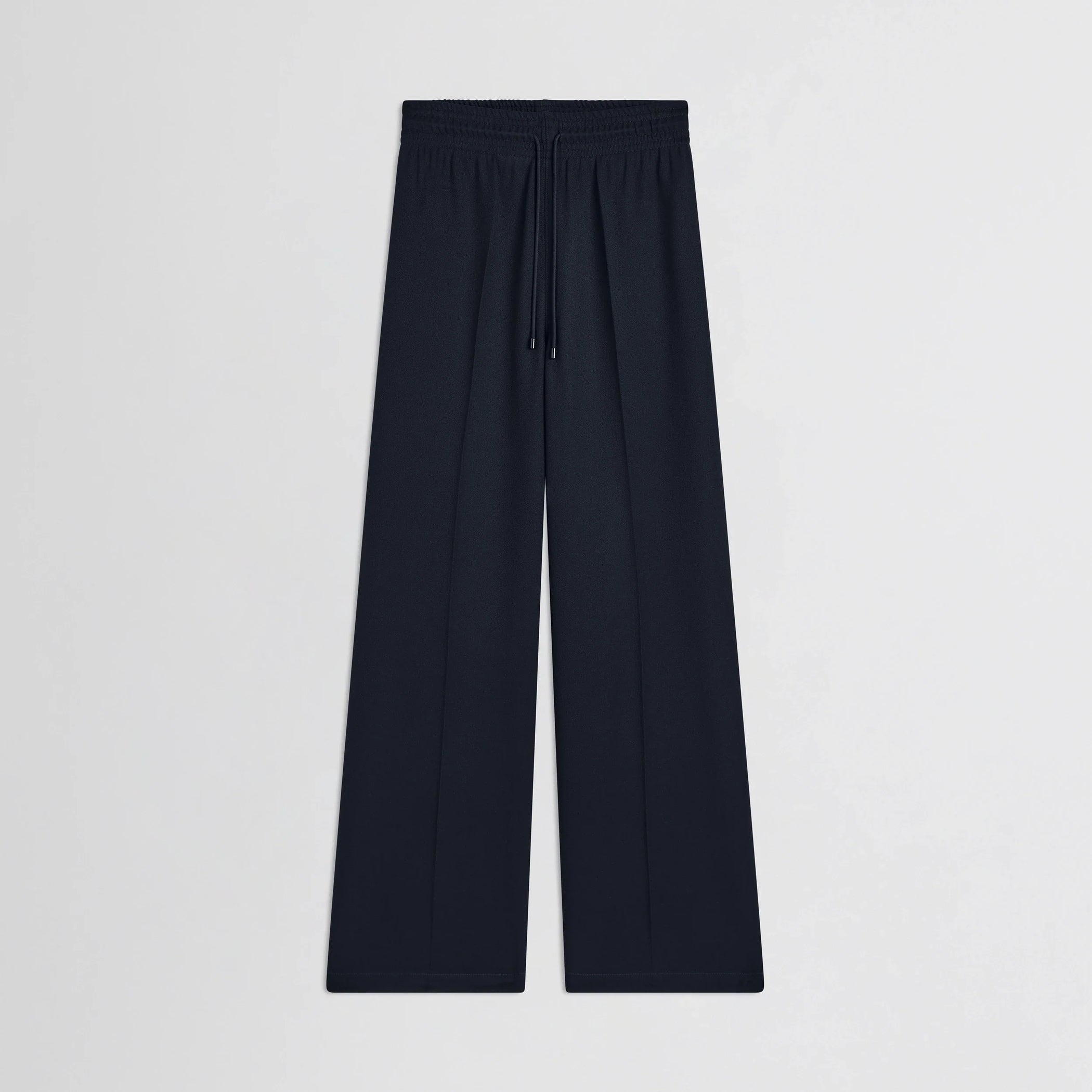 Flat front view of track trousers in navy polyester.