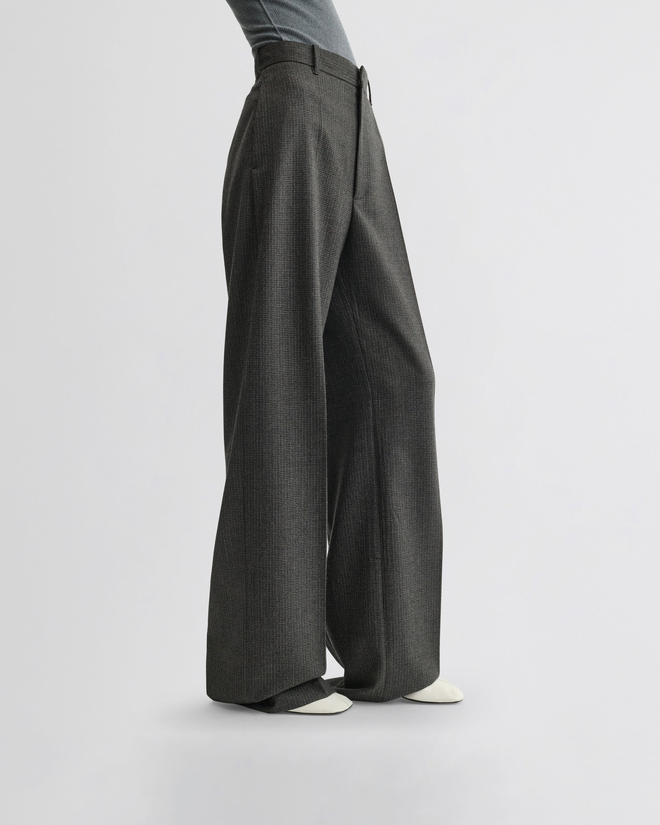View of zip trousers in grey brown melange