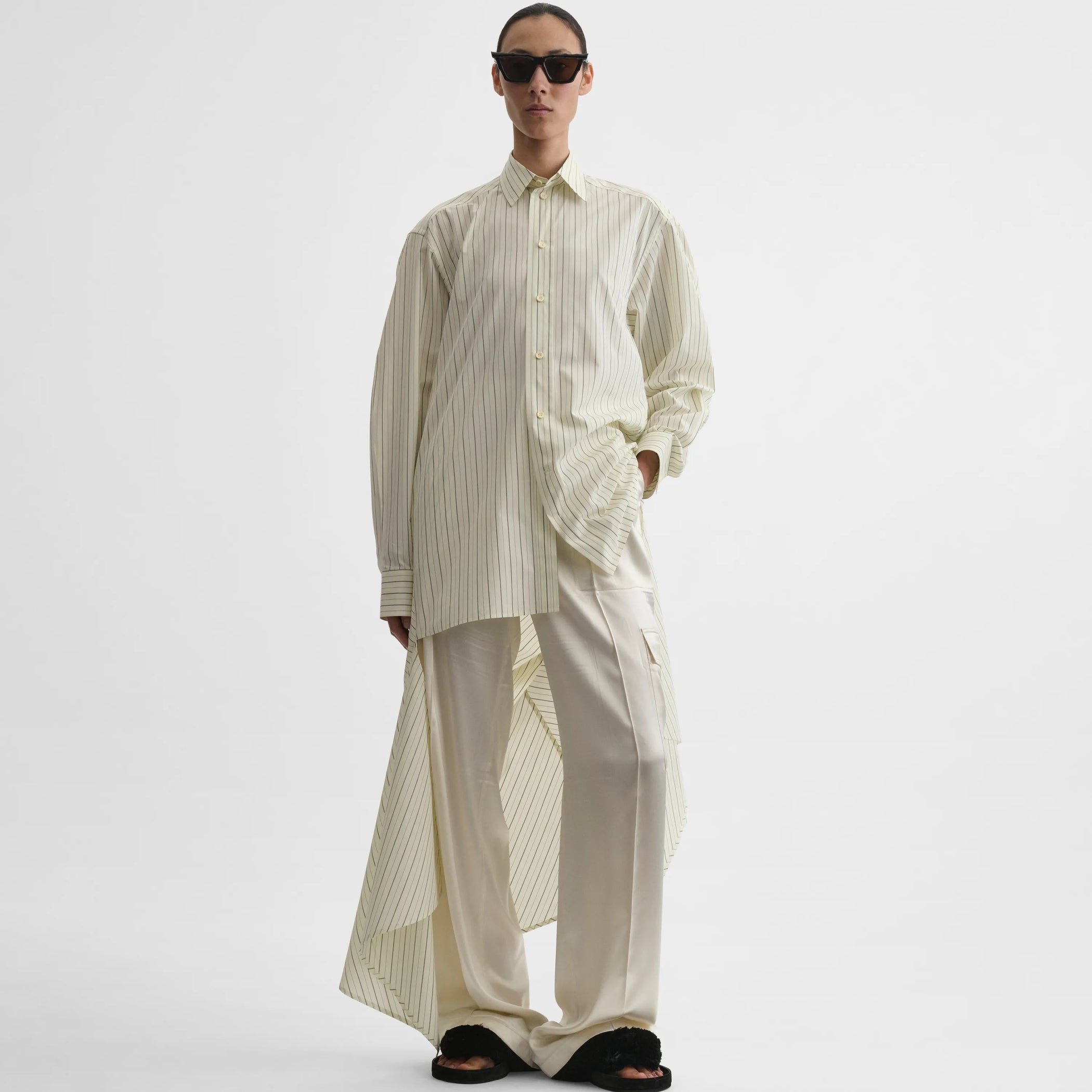 Front view of dropped front shirt in pale lemon cotton