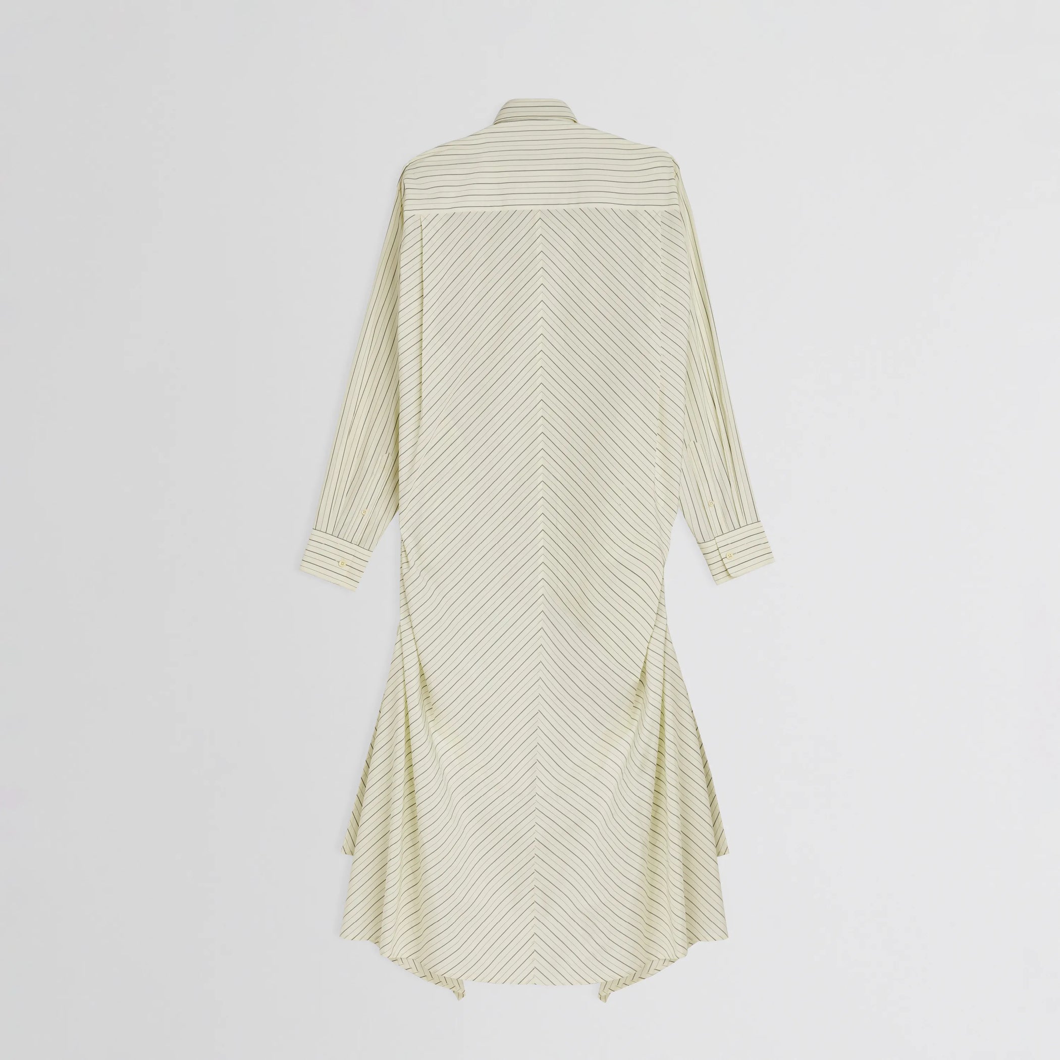 Flat back view of dropped front shirt in pale lemon cotton