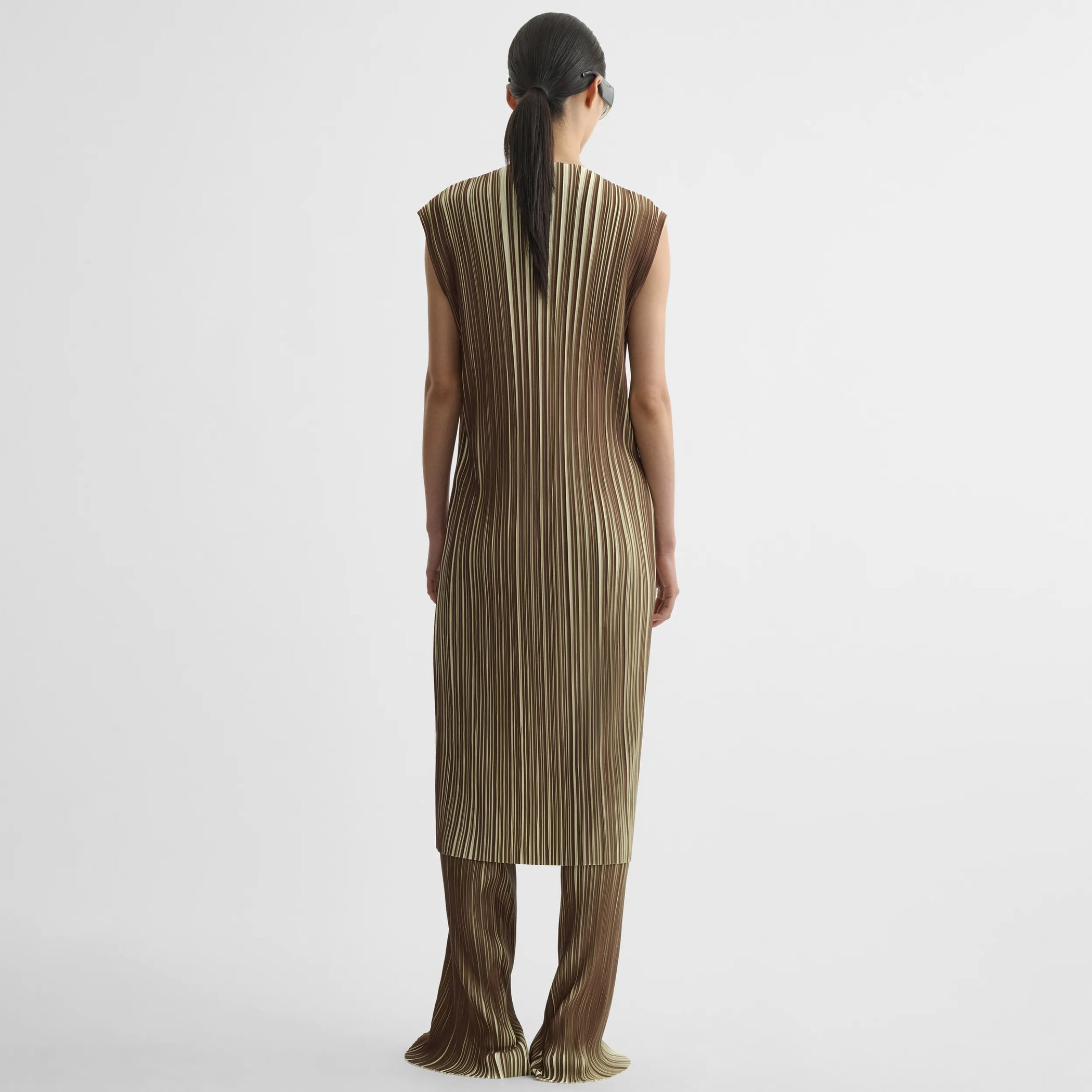 Back view of razor pleat dress in khaki cotton