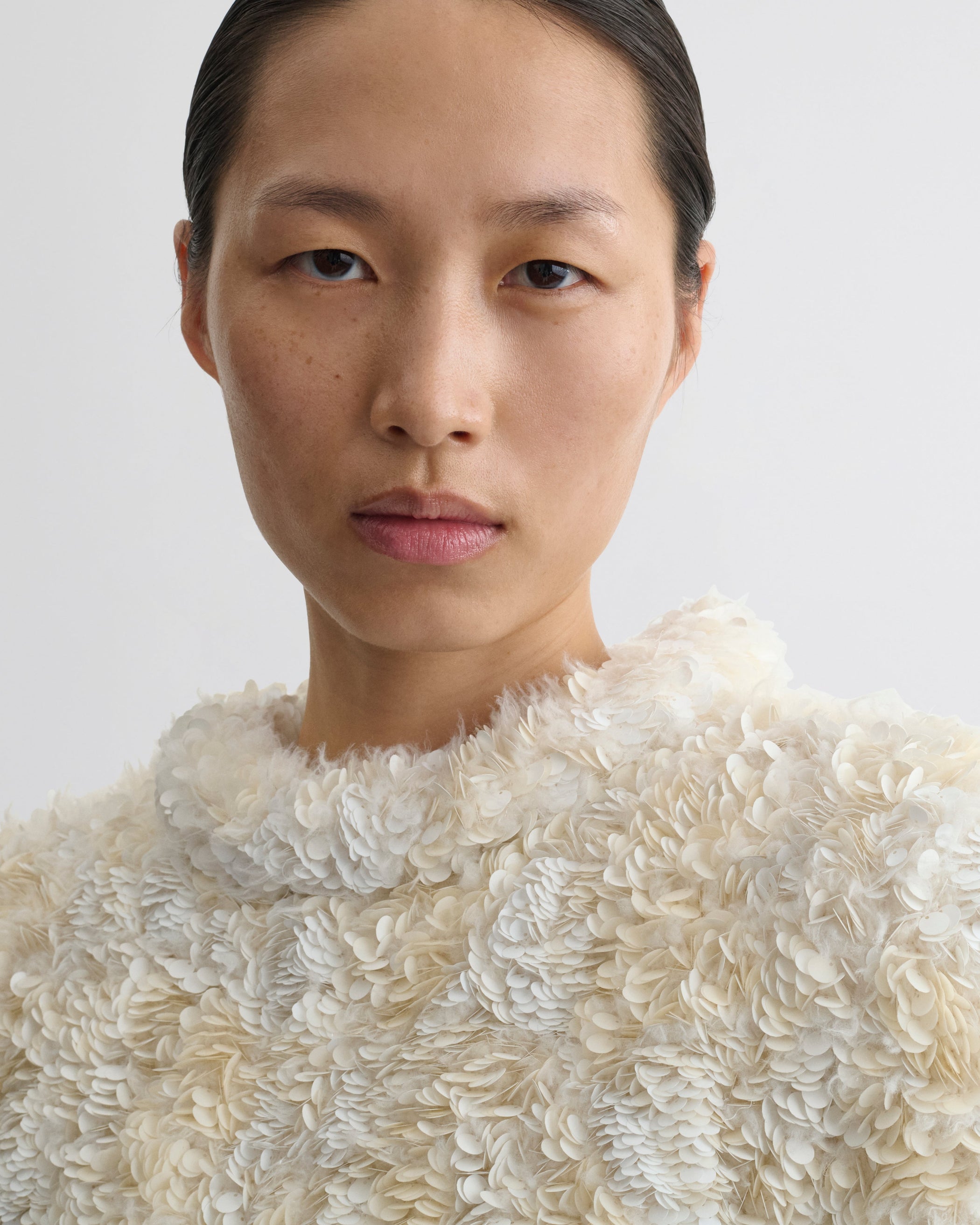 Close up detail view of CLUSTERED SEQUIN DRESS in ivory jersey