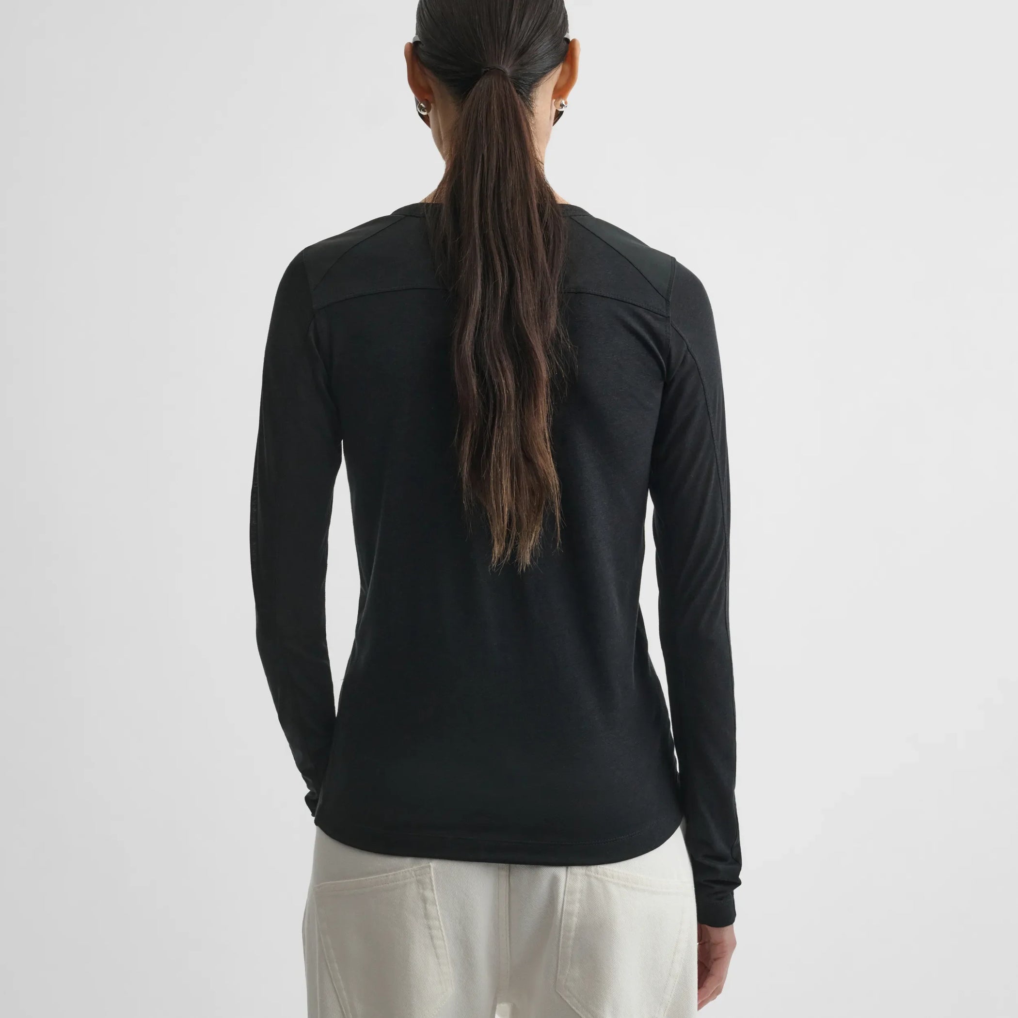 Back view of crewneck top in black cotton