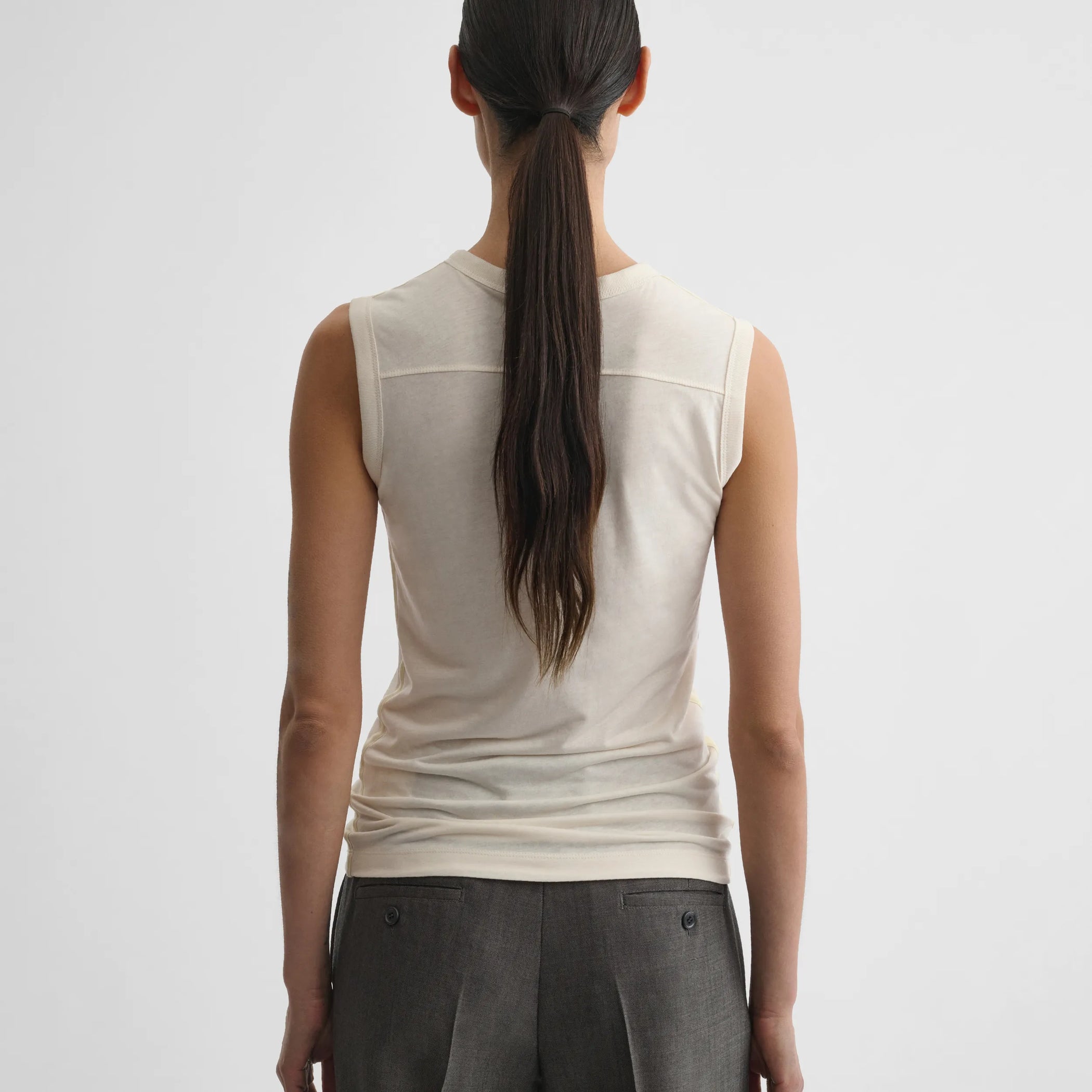 Back view of underpinning tank top in ivory cotton