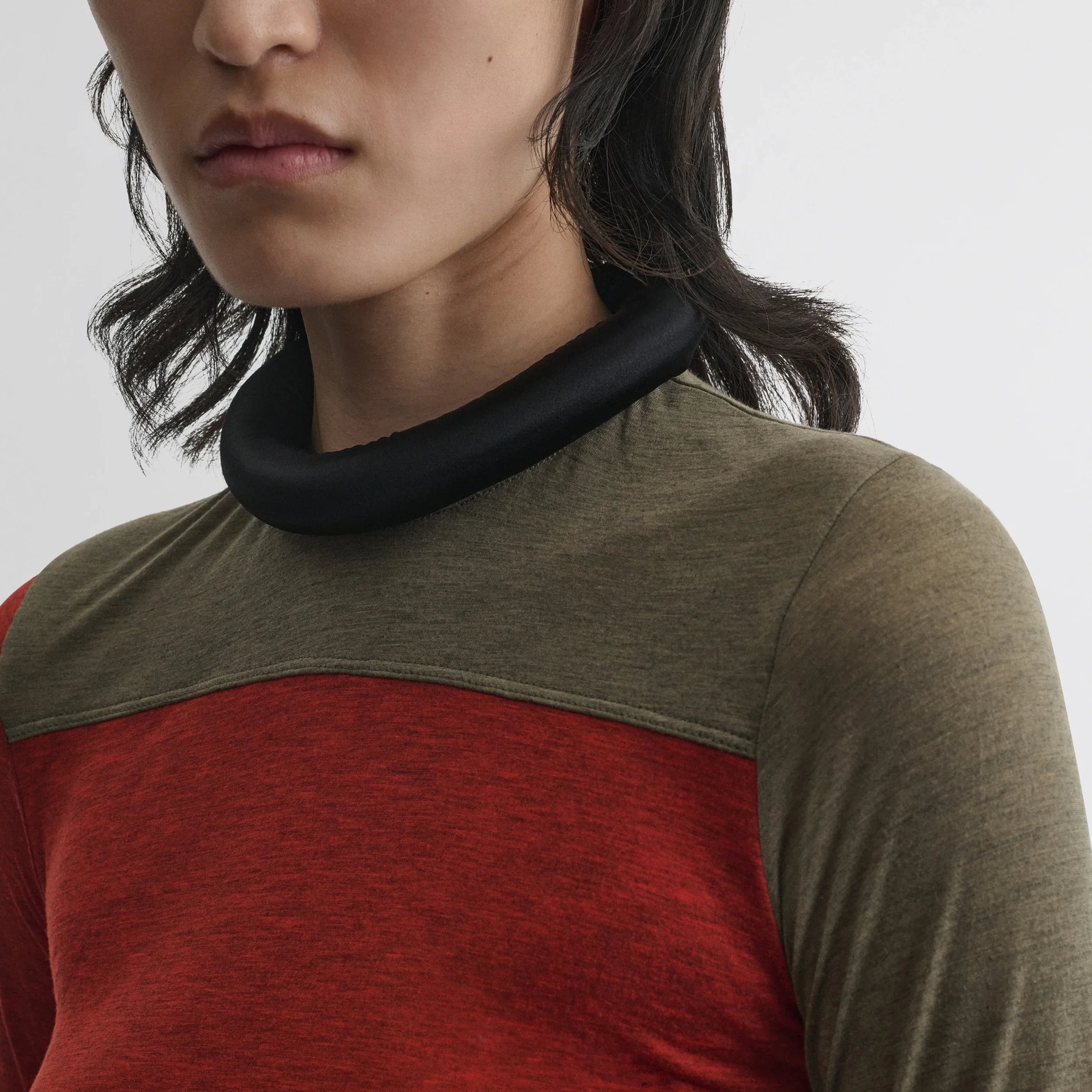 Close up detail view of tubular colour block top in ivory tobacco red cotton.