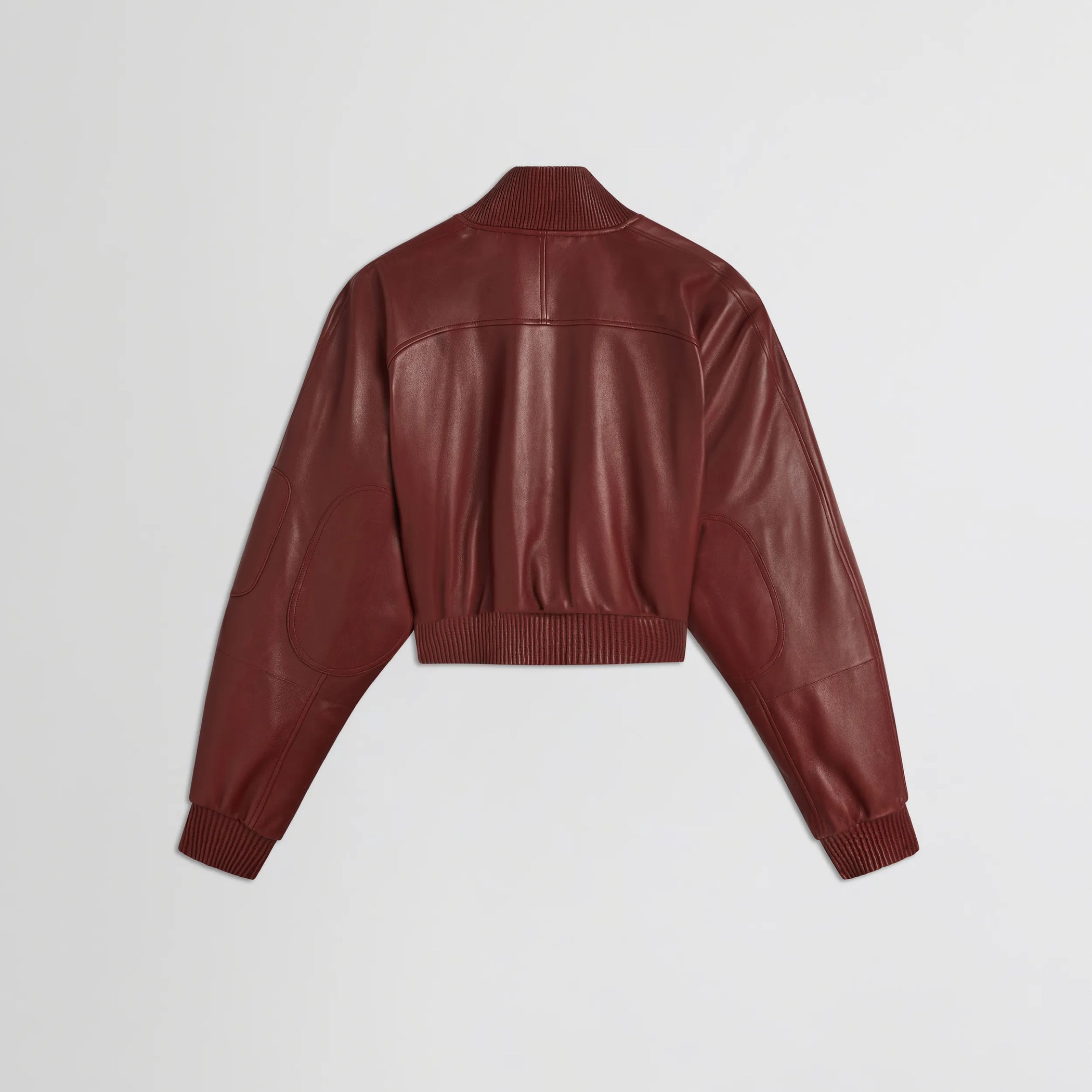 Flat back view of pocket bomber jacket in brick leather