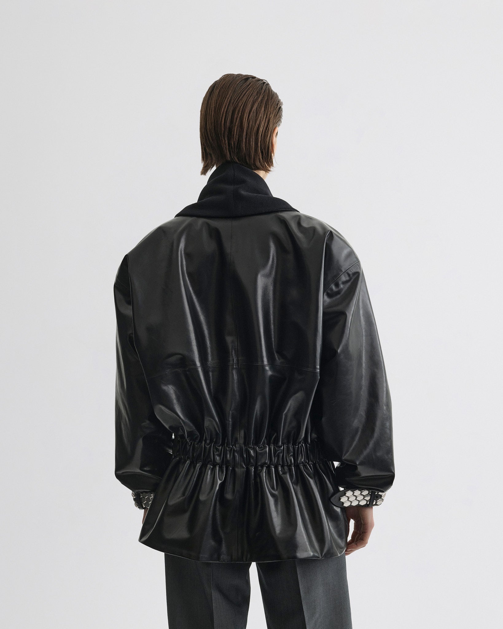 Back view of Stud Jacket in black leather