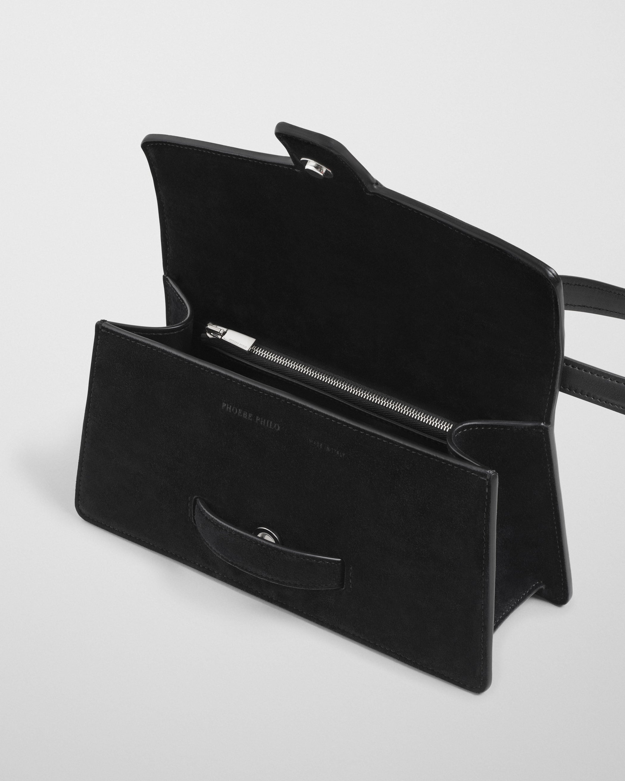 Close up detail view of SMALL BAR BAG in black suede