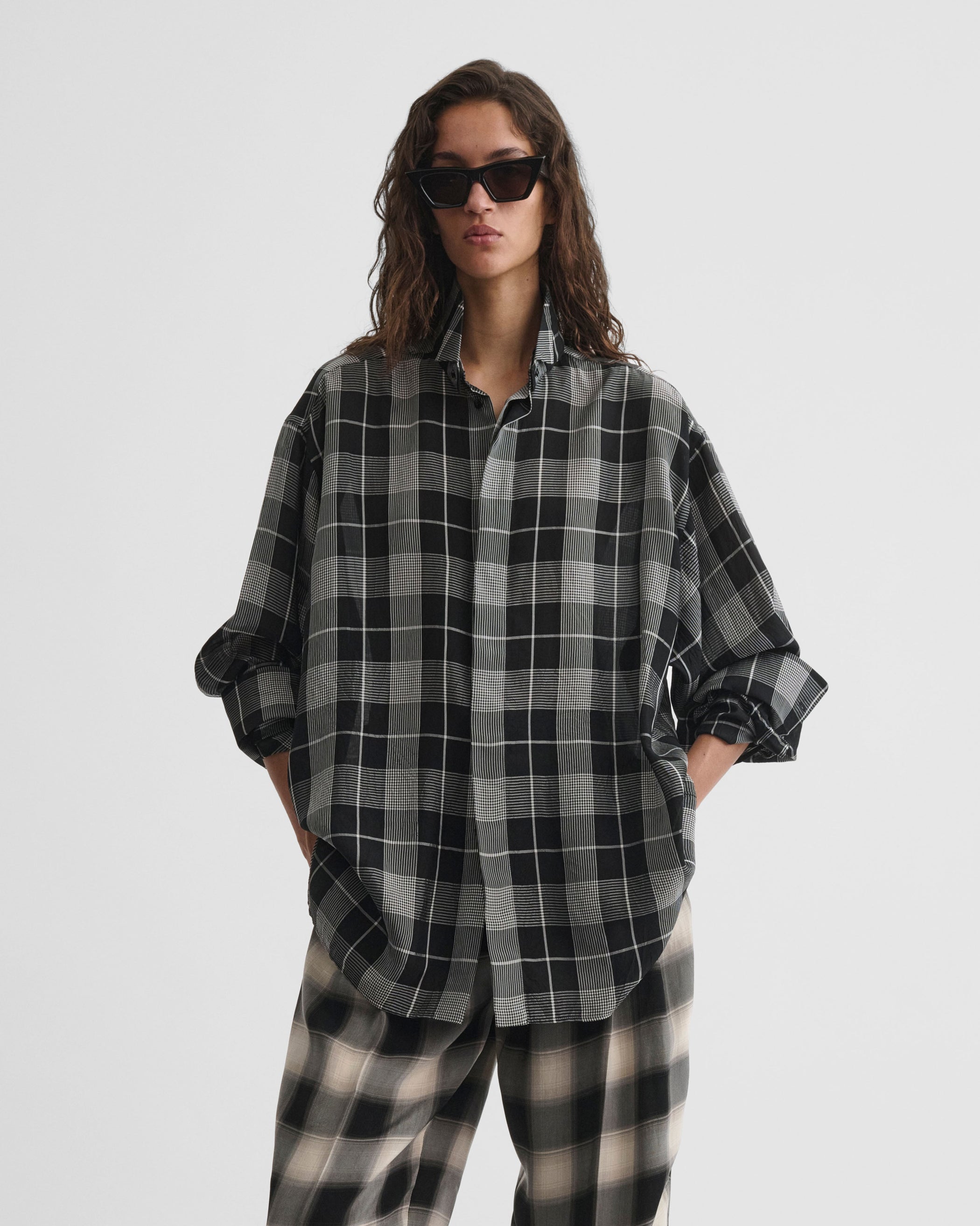 Front view of model wearing CUSTOM TUX SHIRT in b/w check viscose