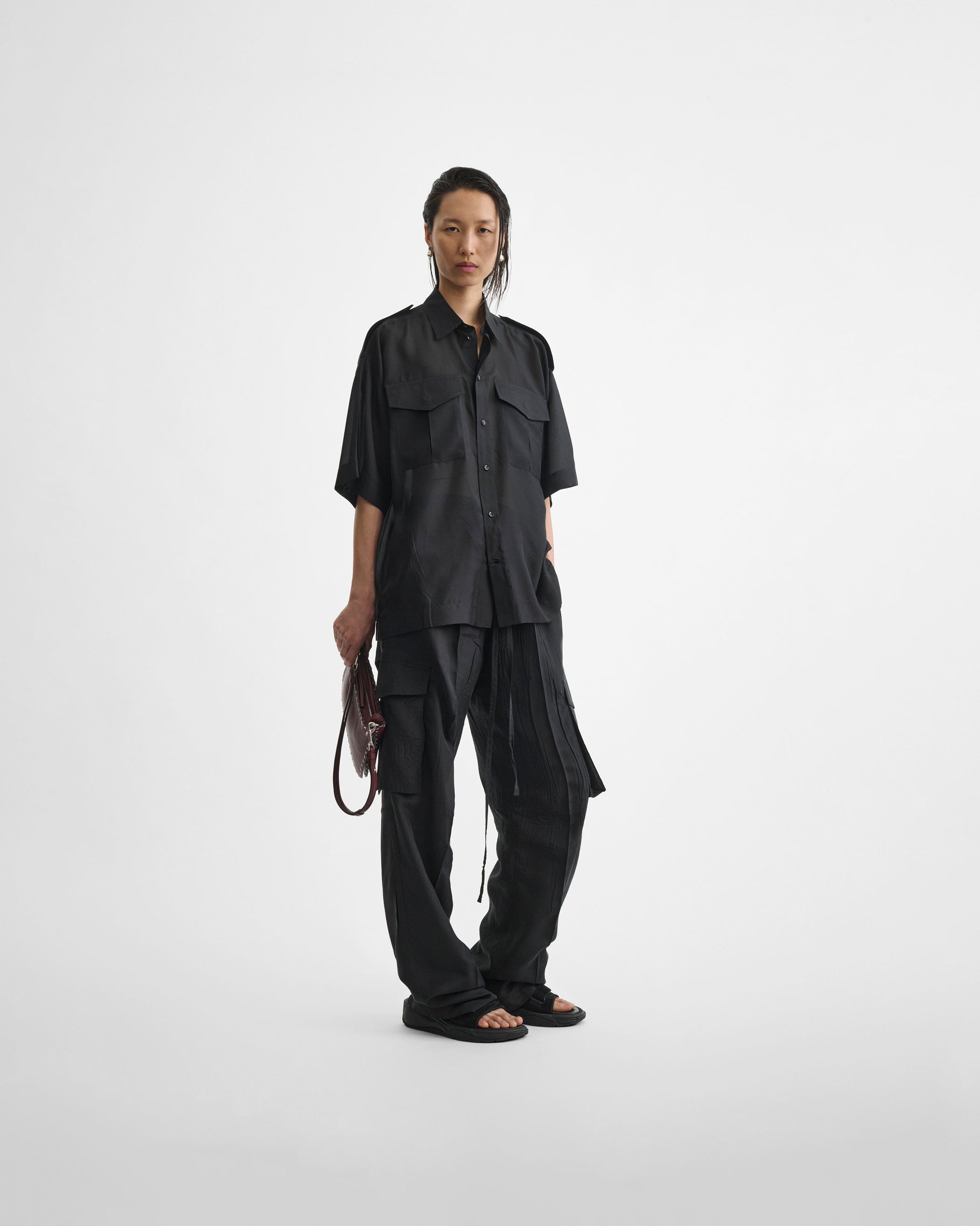 Front view of model wearing LITE UTILITY SHIRT in black habotai silk