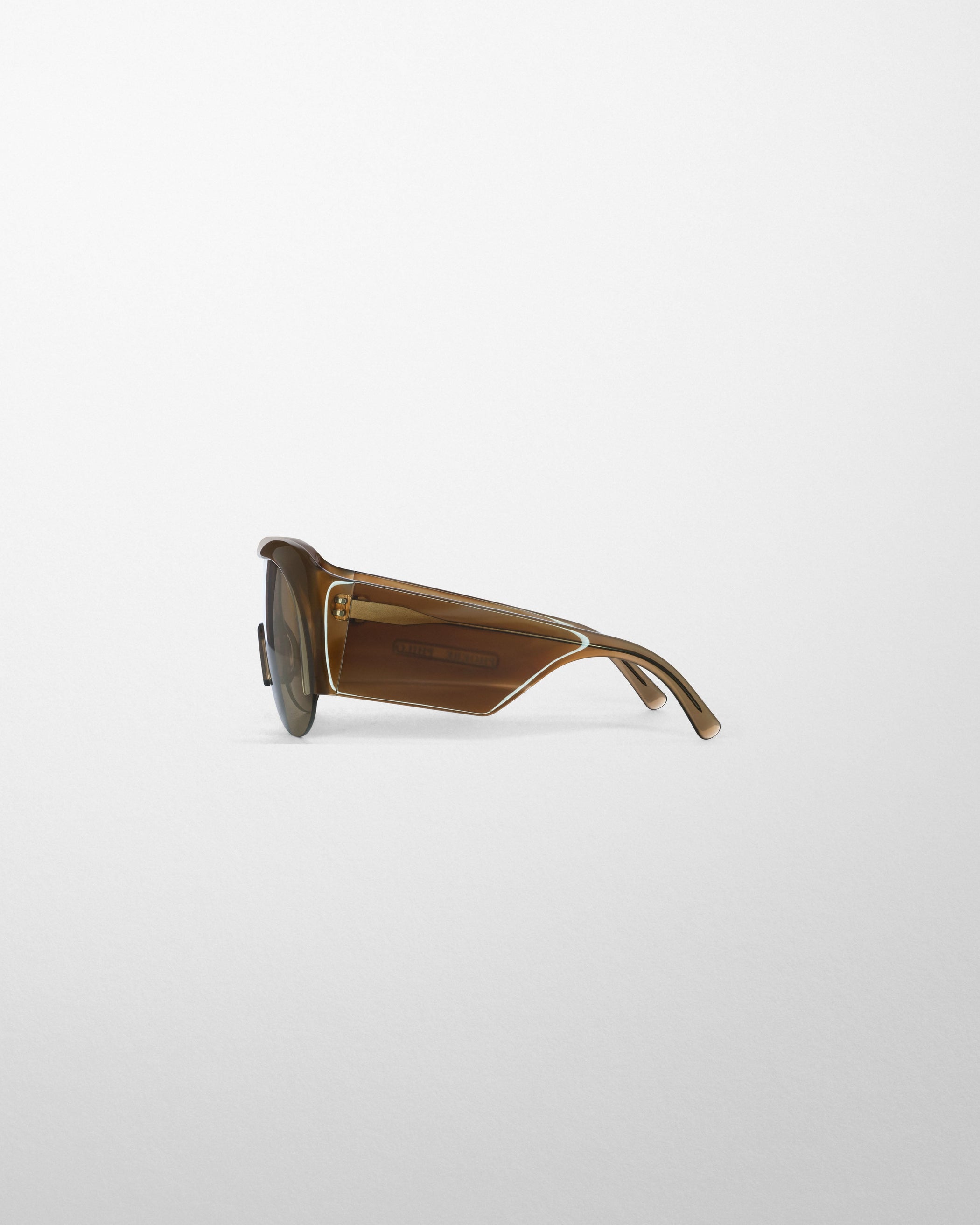 Flat side view of HALF BOMBE SUNGLASSES in conker tortoiseshell acetate