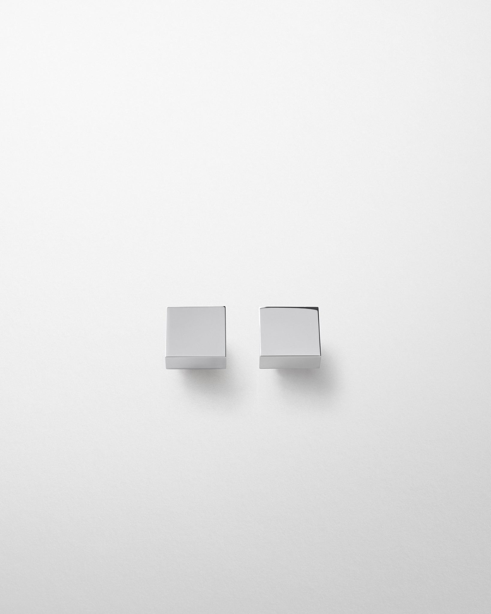 Front view of CUBE STUDS in silver