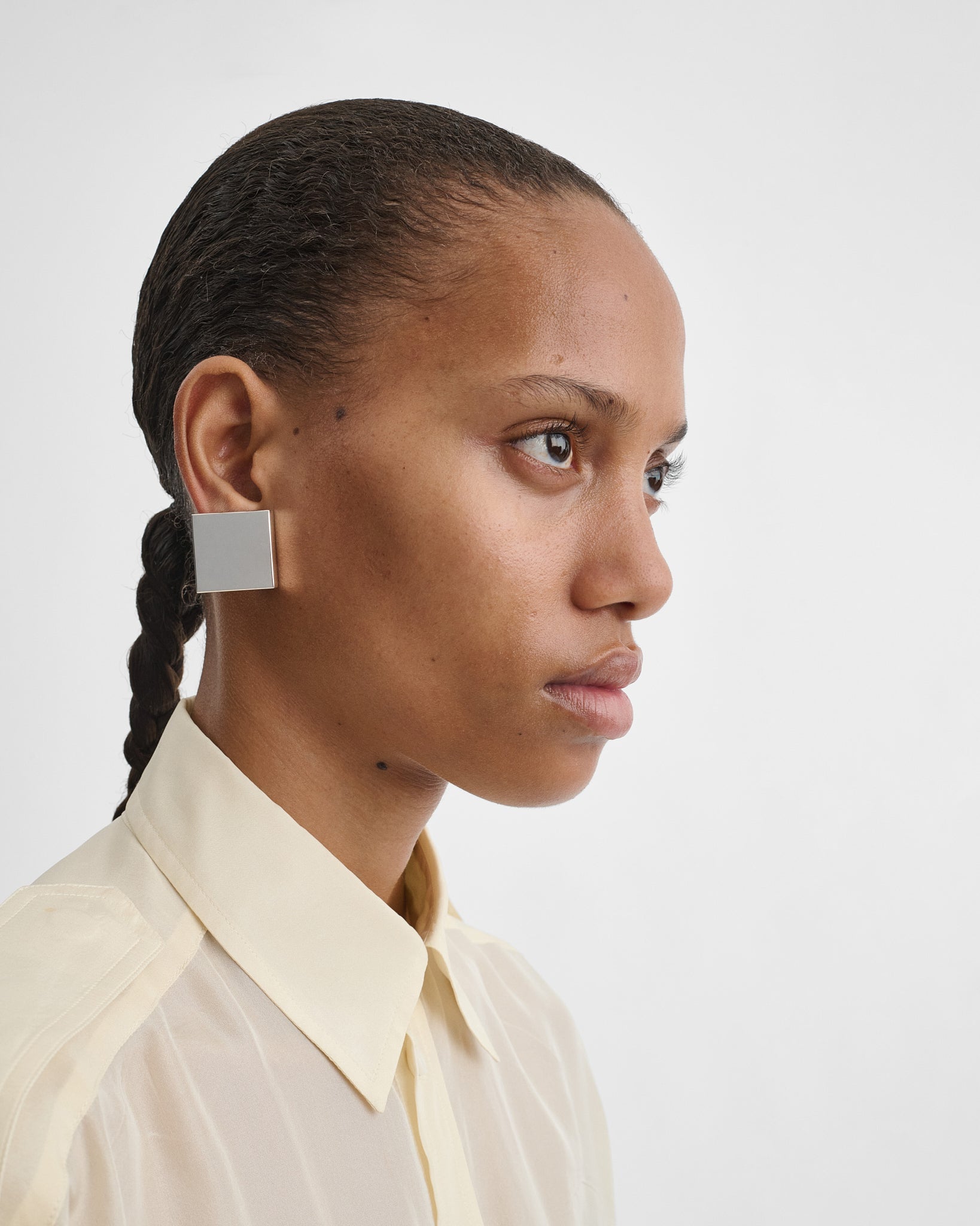 Front view of CUBE STUDS in silver