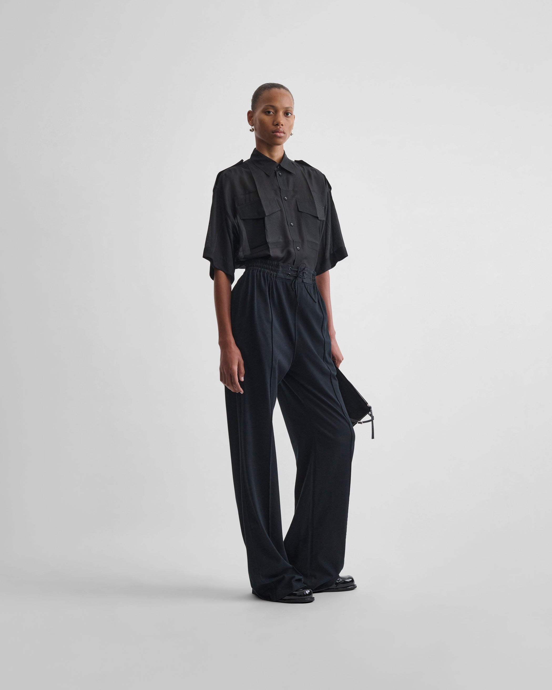 Front view of model wearing JOGGER in black jersey