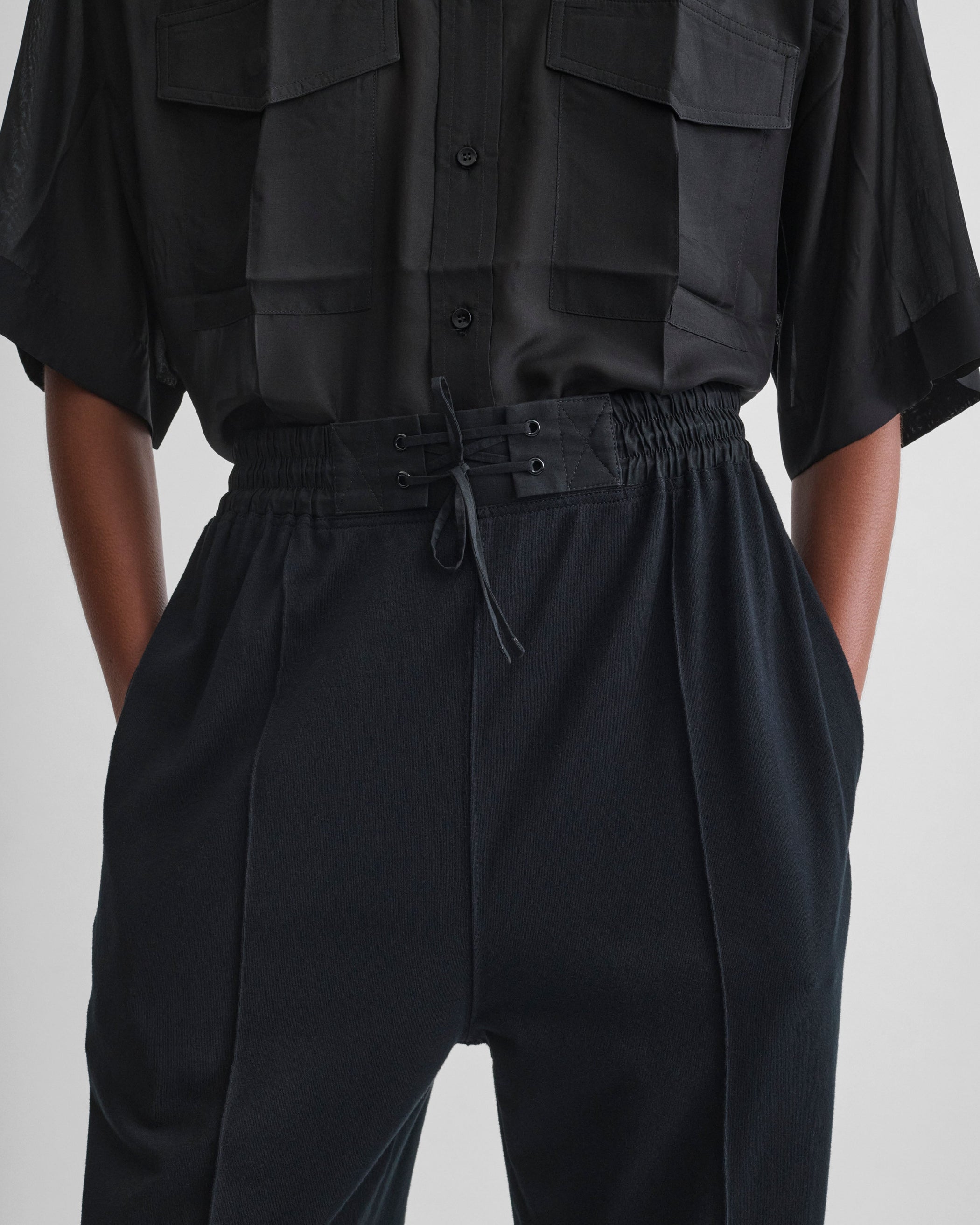 Detail view of model wearing JOGGER in black jersey