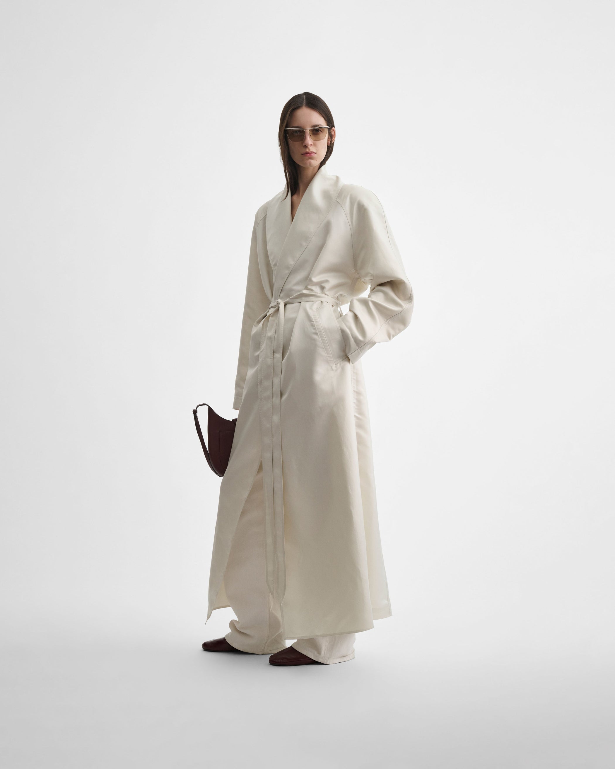 Front view of model wearing BELTED ROBE DRESS in salty white silk