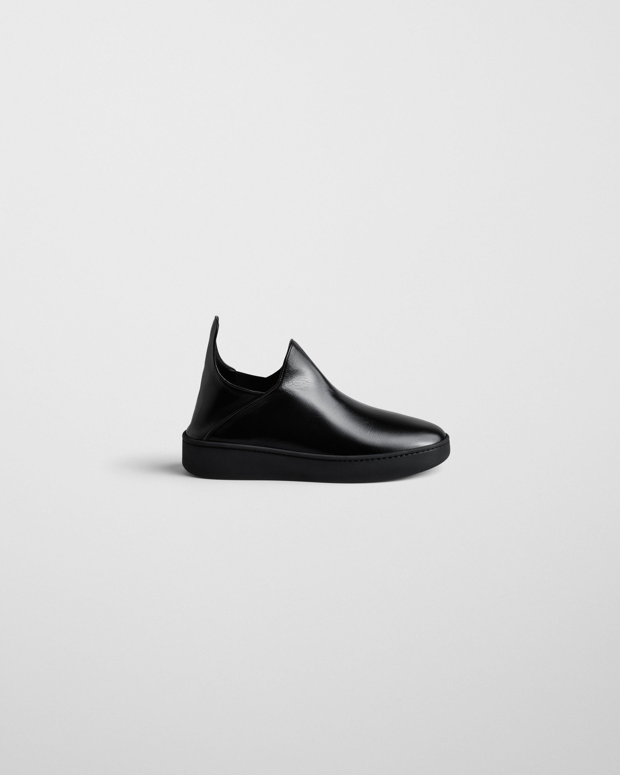 Side view of SLIP ON SNEAKER in black suede