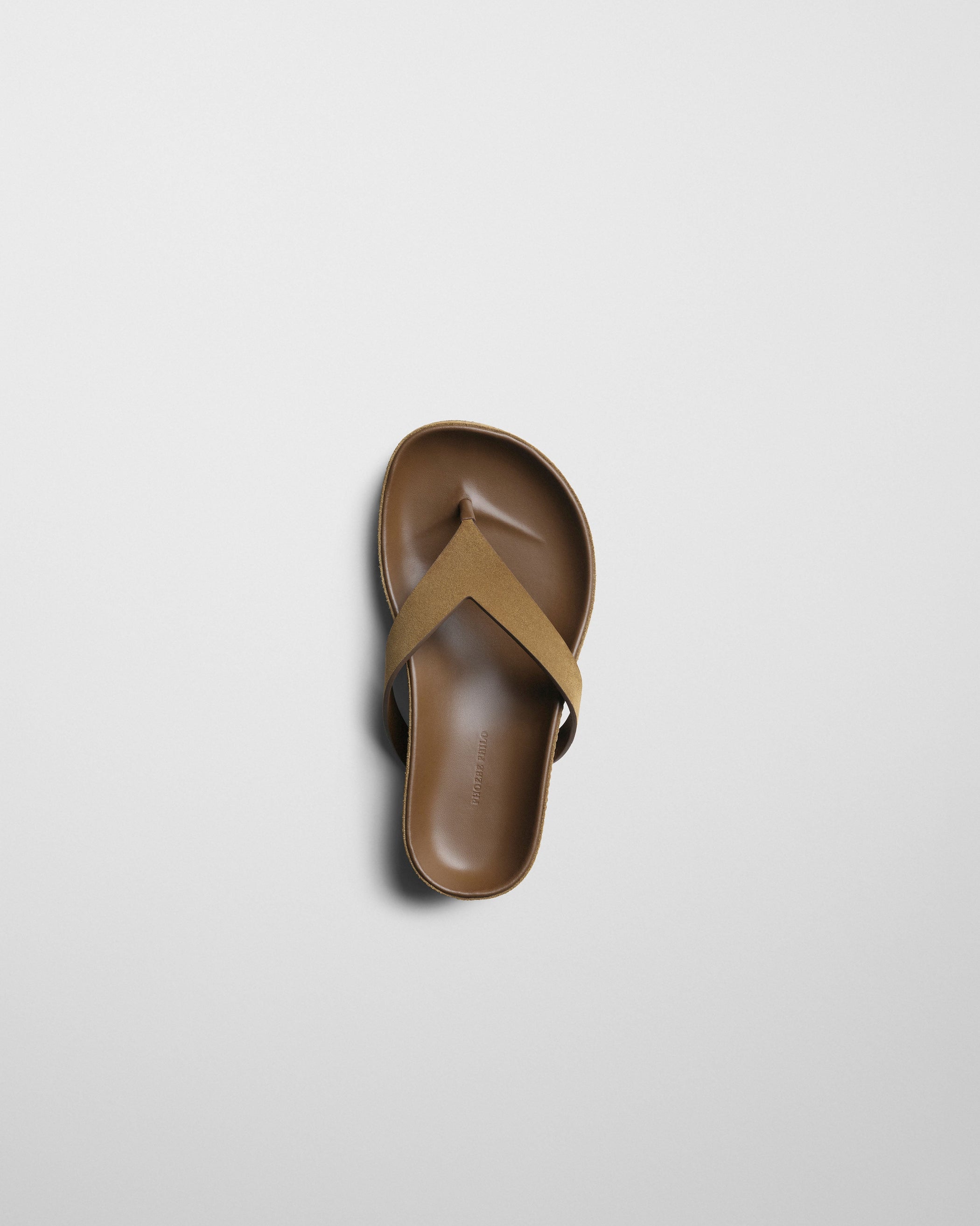 Top view of ROUND FLIP FLOP in caramel suede