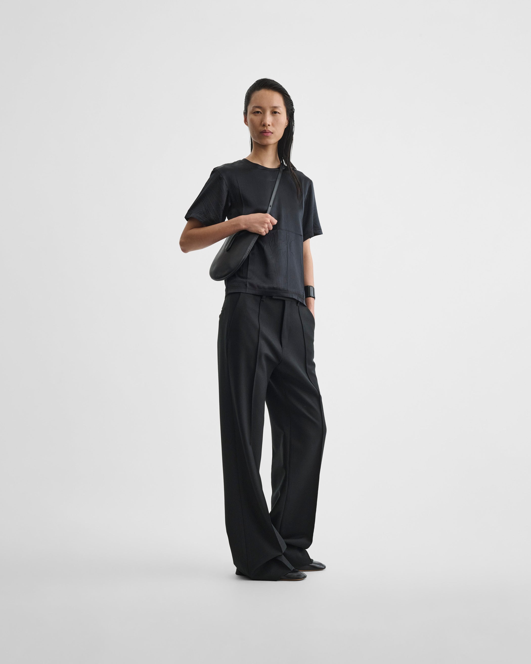 Front image of model wearing GRAPHIC T in black silk