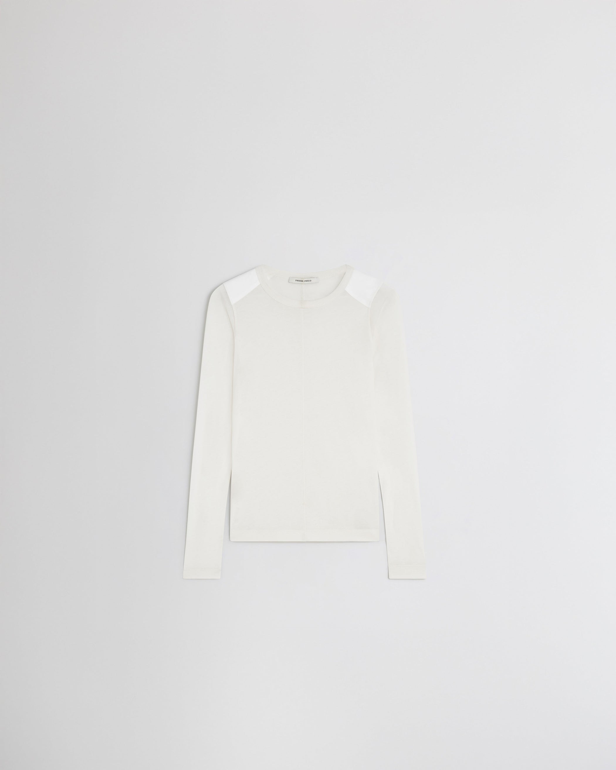 Flat front view of CREW NECK TOP in cream cotton